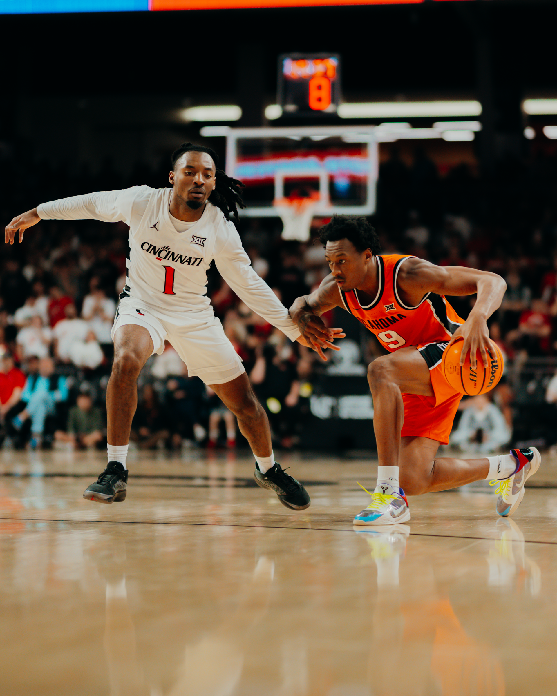 Anthony Roy making a move before stepping back and shooting a threepointer.