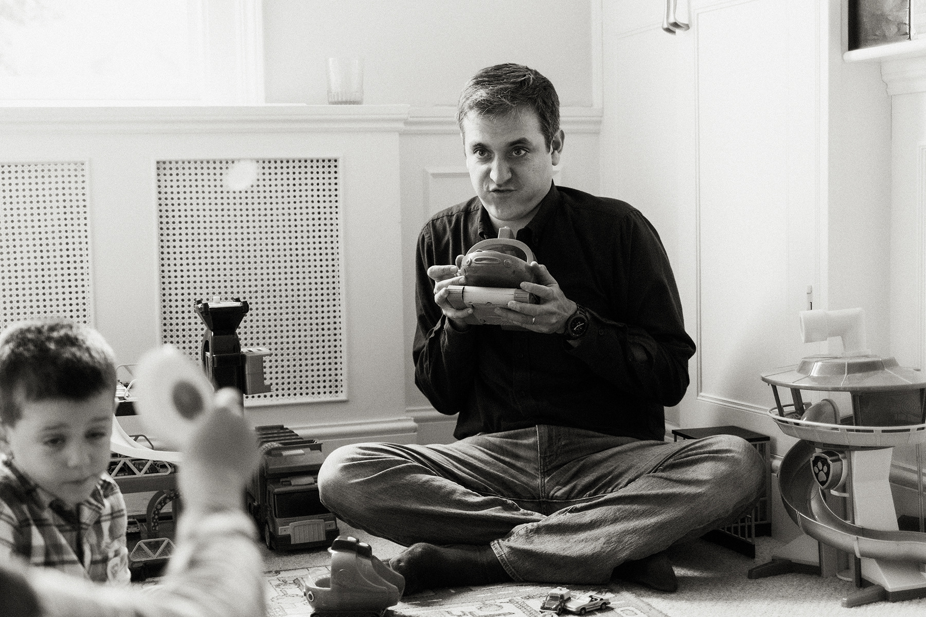 dad playing with sons