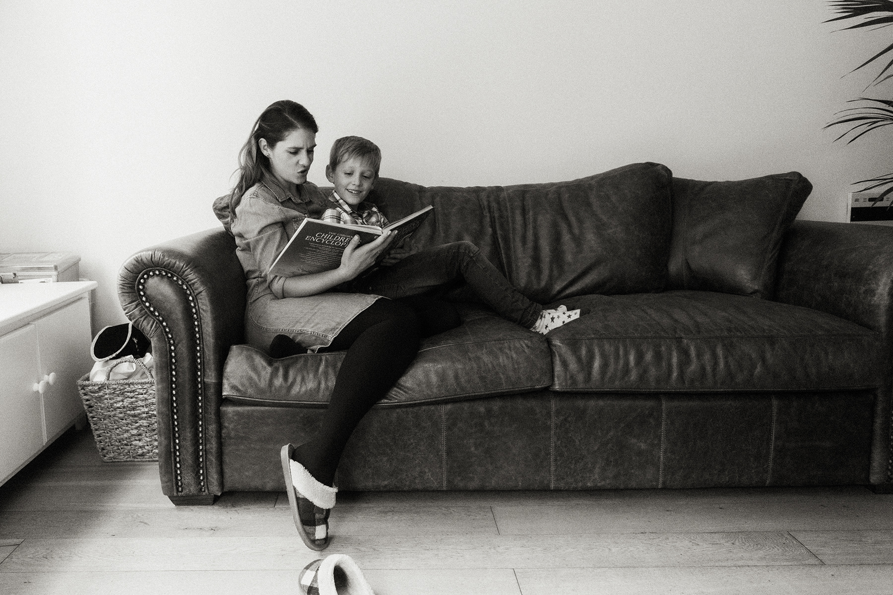 mother reading story to son