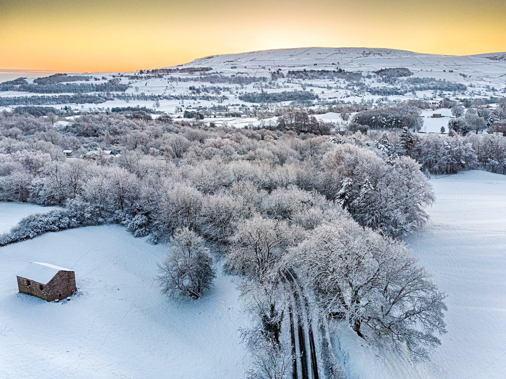 Sunrise behind Penhill