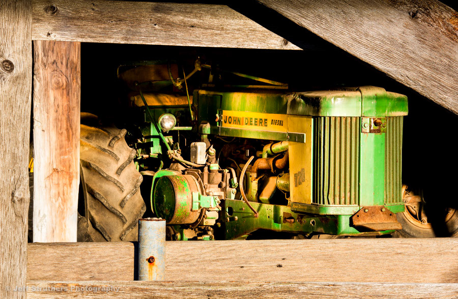 Old John Deere Tractor in Barn