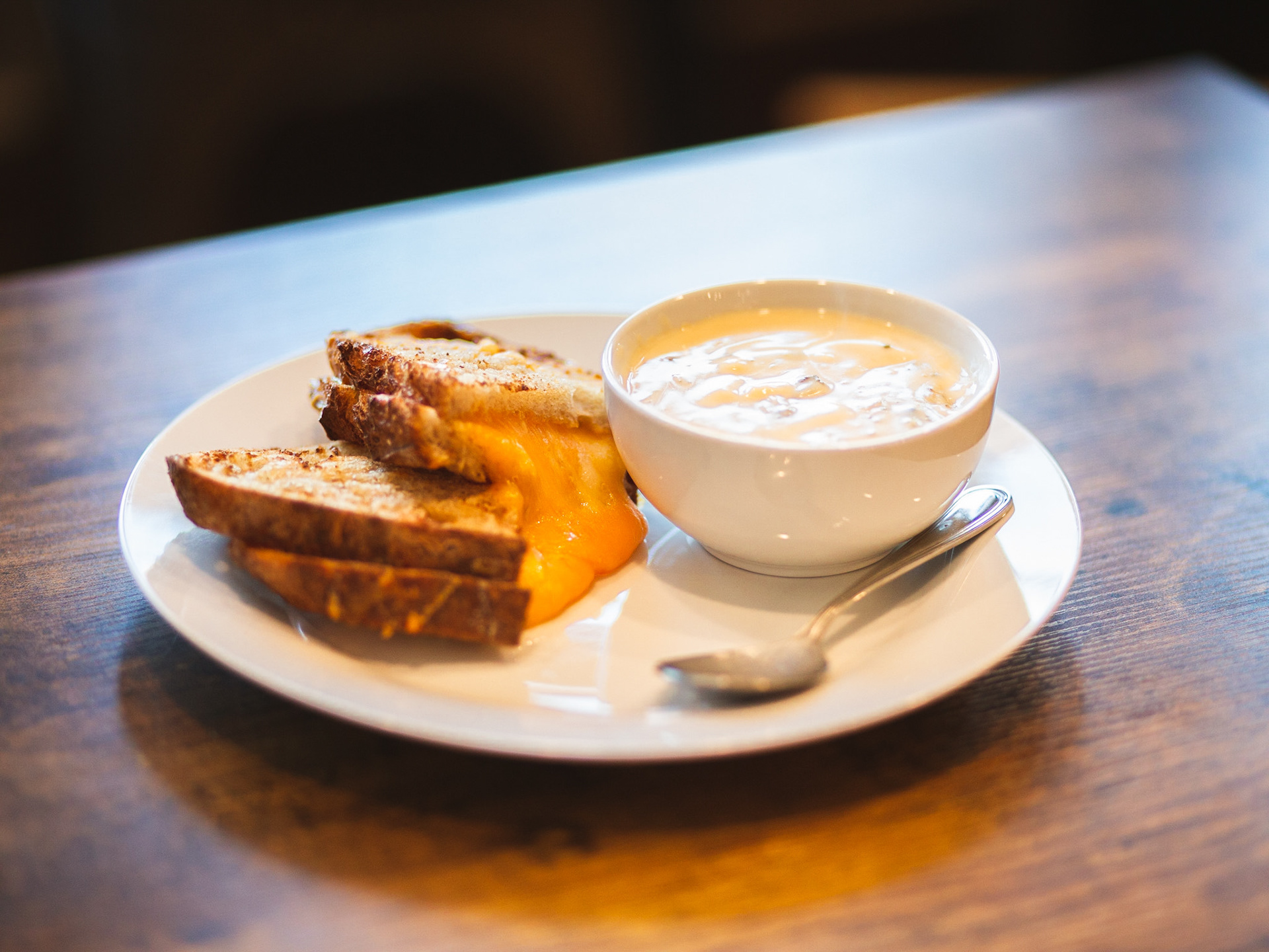 Sourdough Grilled Cheese with cup of Broccoli Cheddar
