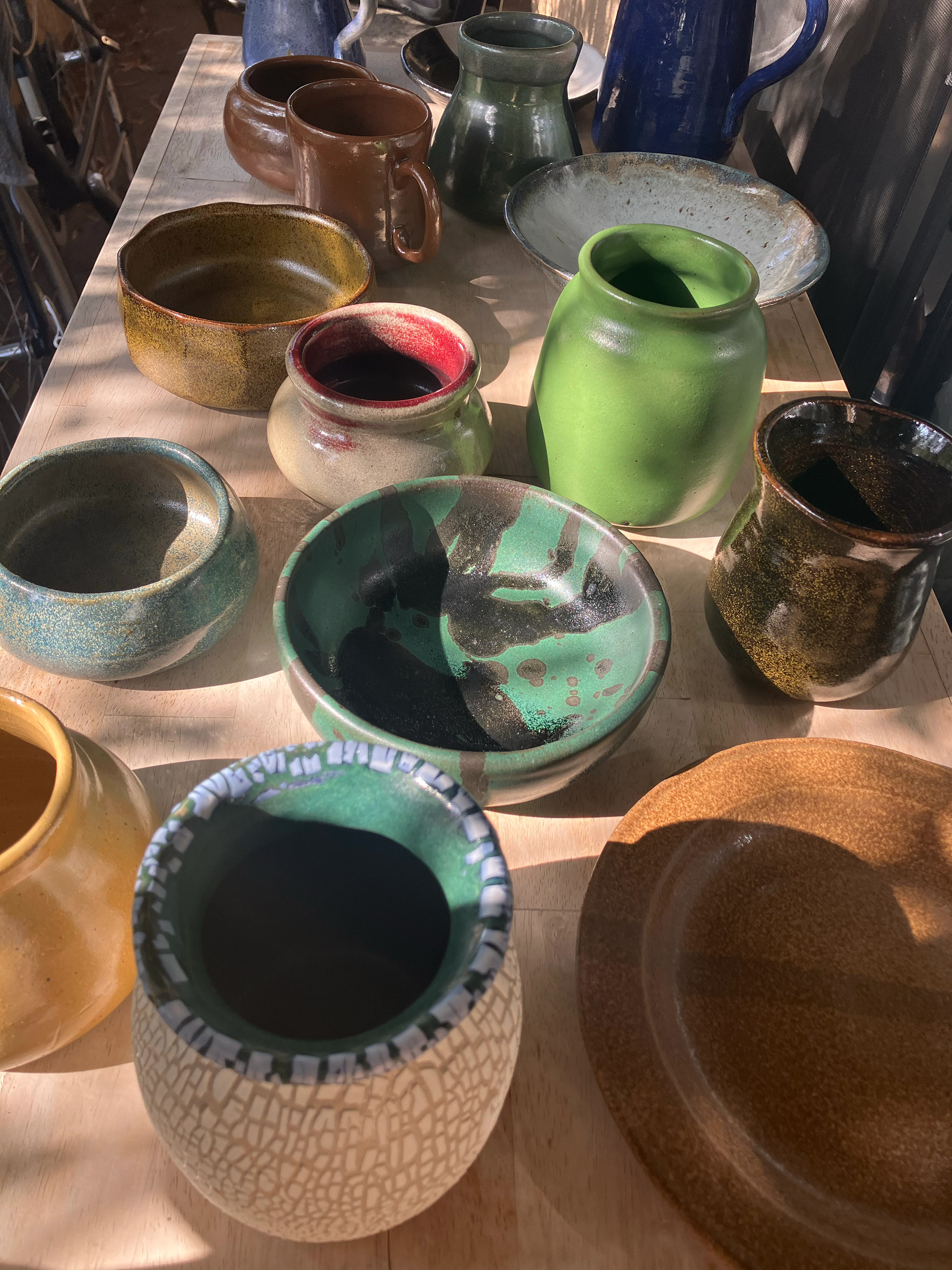 Wheel thrown vases, bowls, plates, pitchers, and mugs