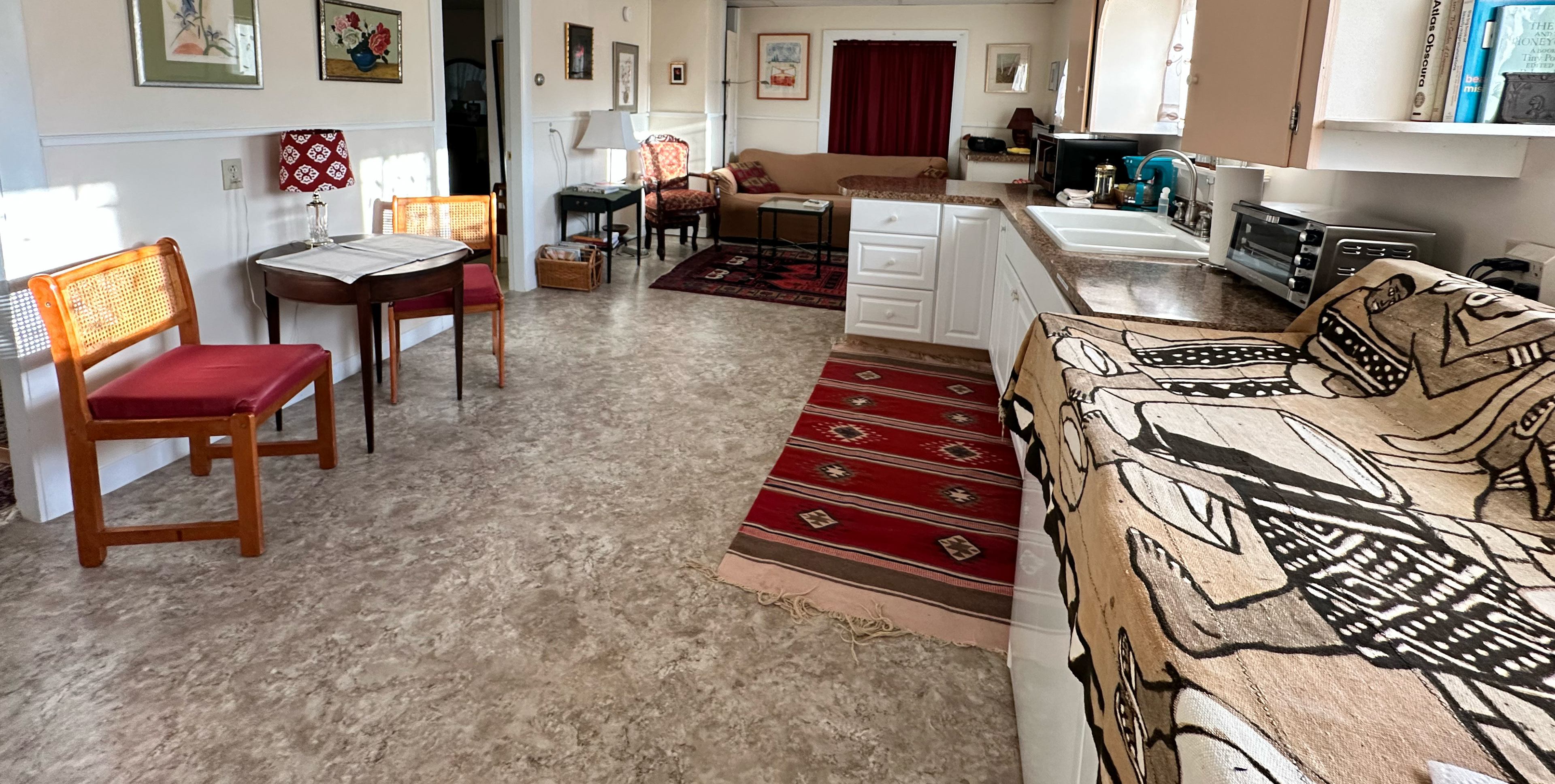 Living room/ sitting area, kitchen and washer—dryer