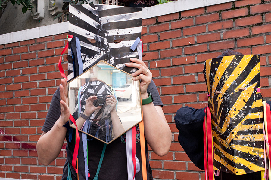 Mask performance as part of Cul de Sac Ville Project by Jooyoung Lee, detail, 2022