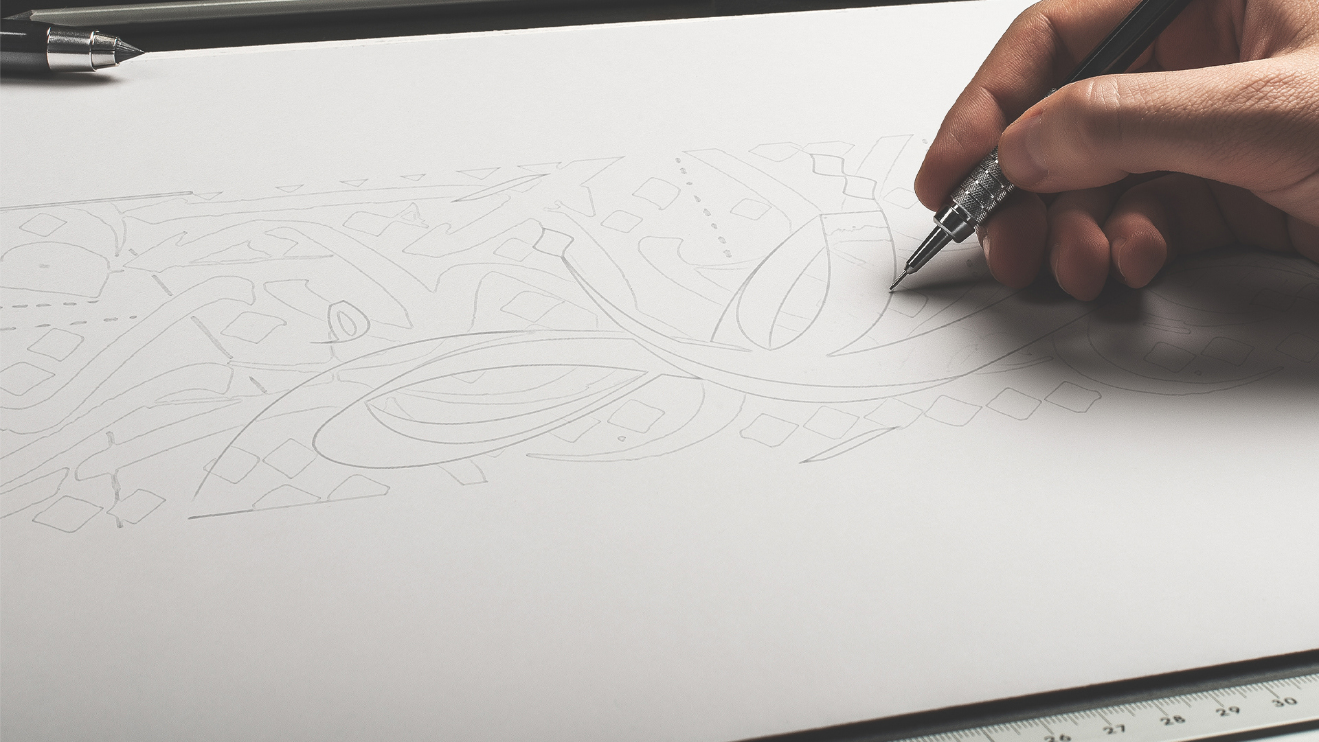 Yotqnho logo in Arabic calligraphy
