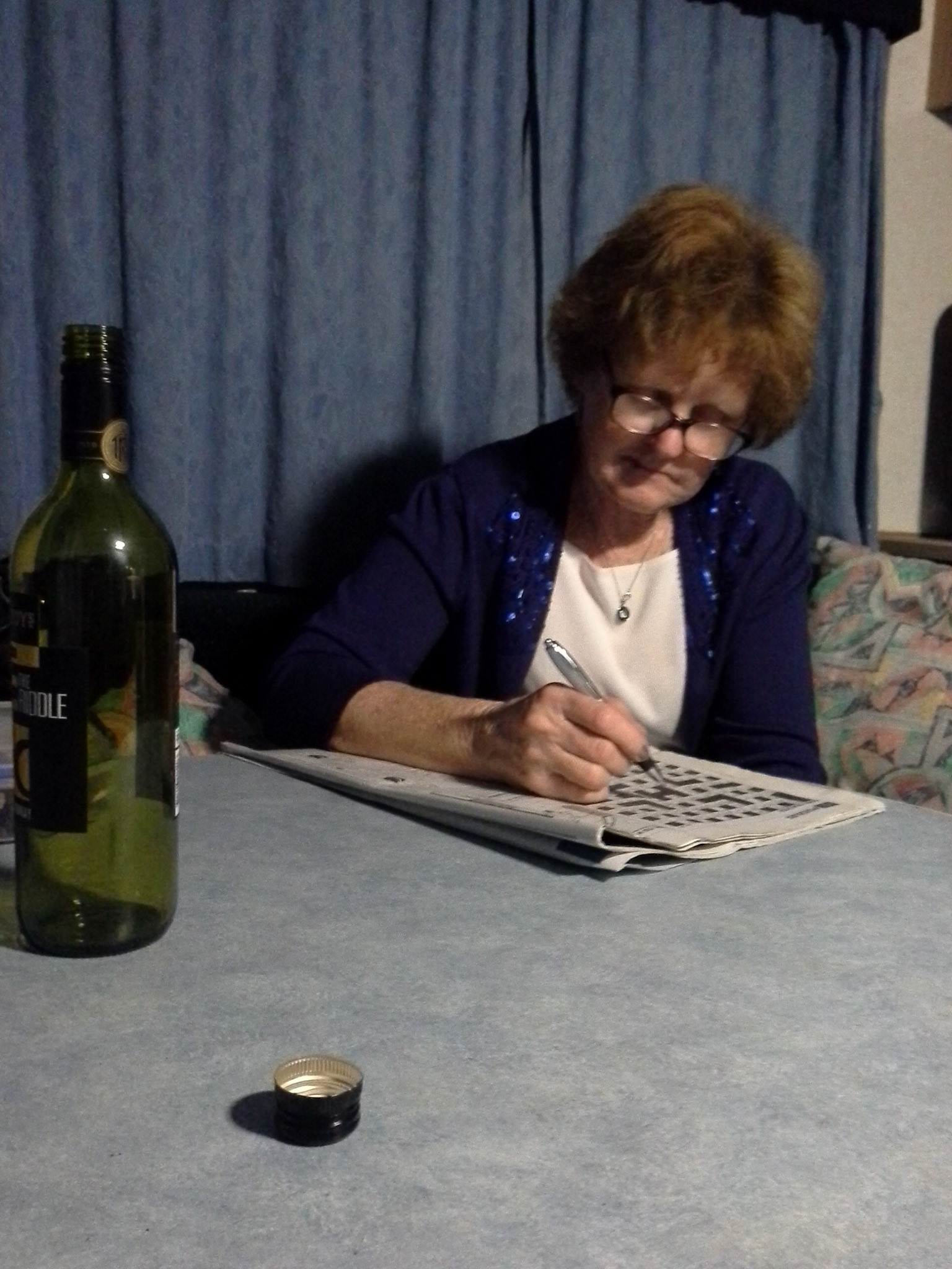 The Crossword for me while he is playing with his gadgets.