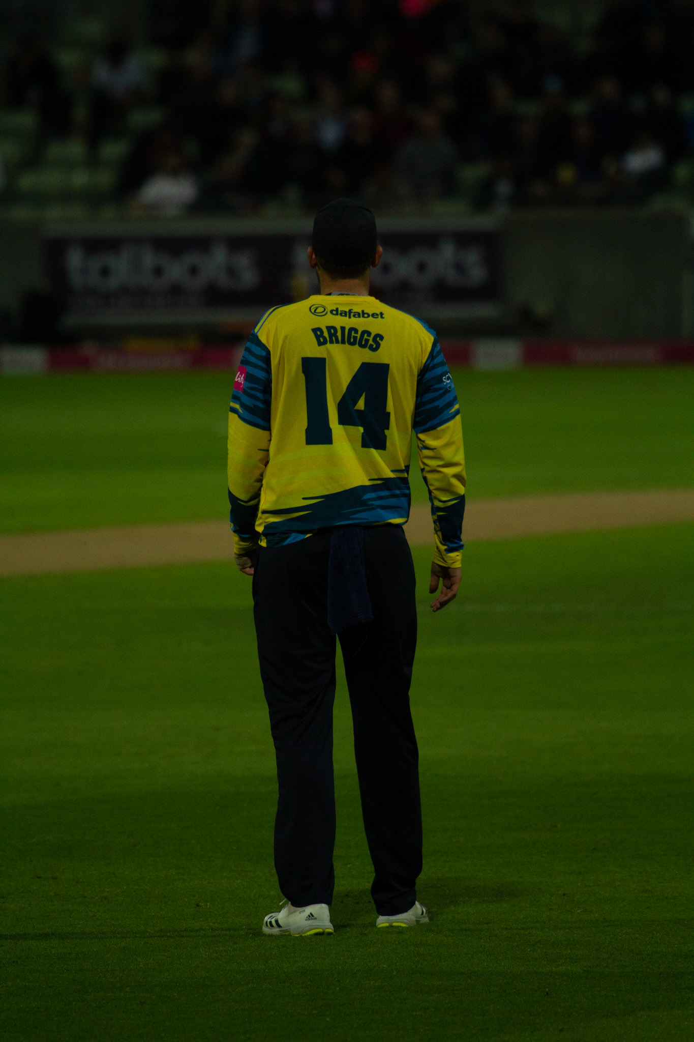 Danny Briggs watches on from fine leg