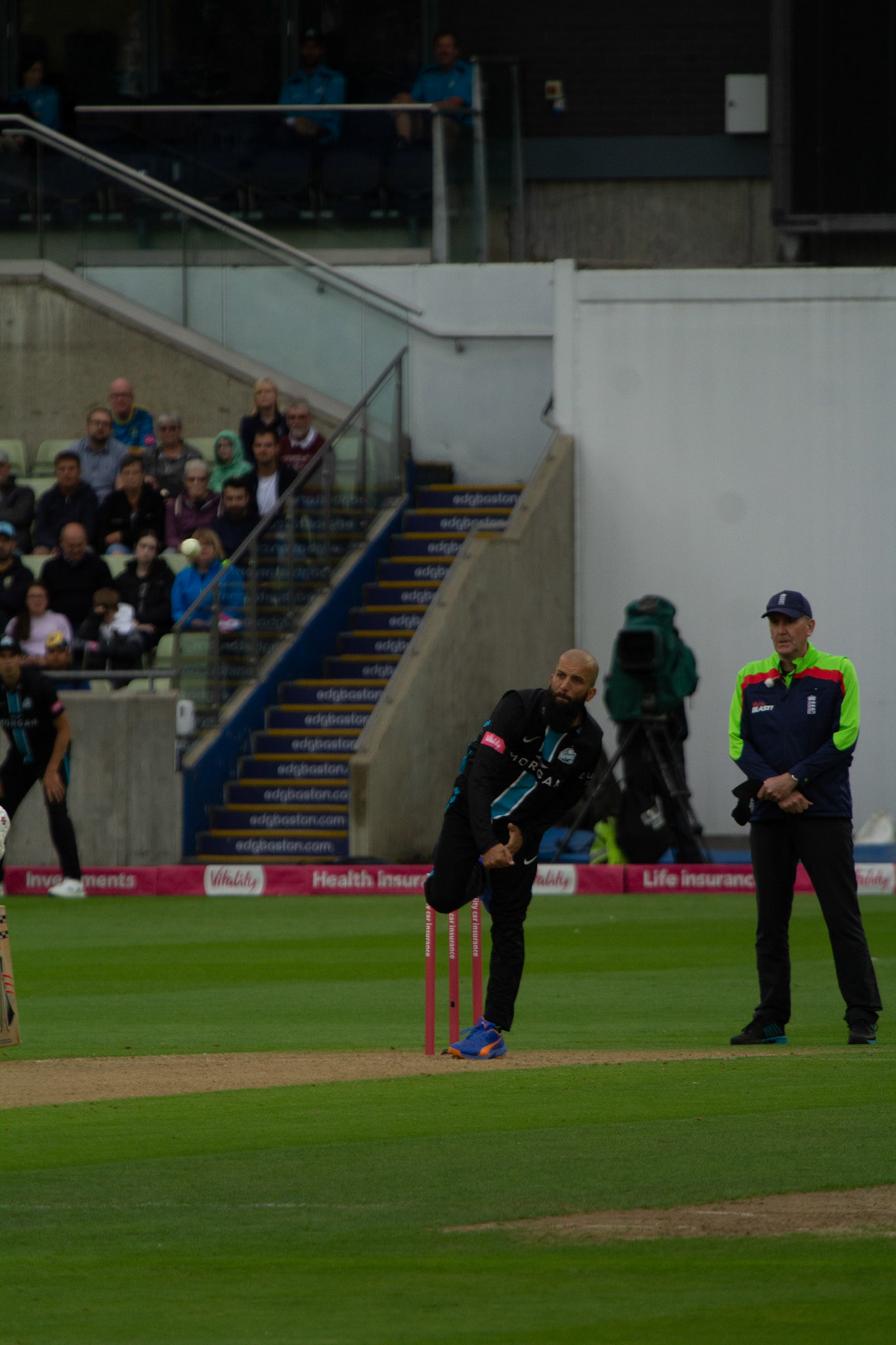 Moeen releasing the ball