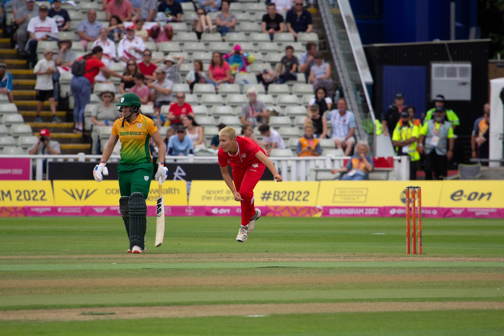 Issy Wong leaping from the crease