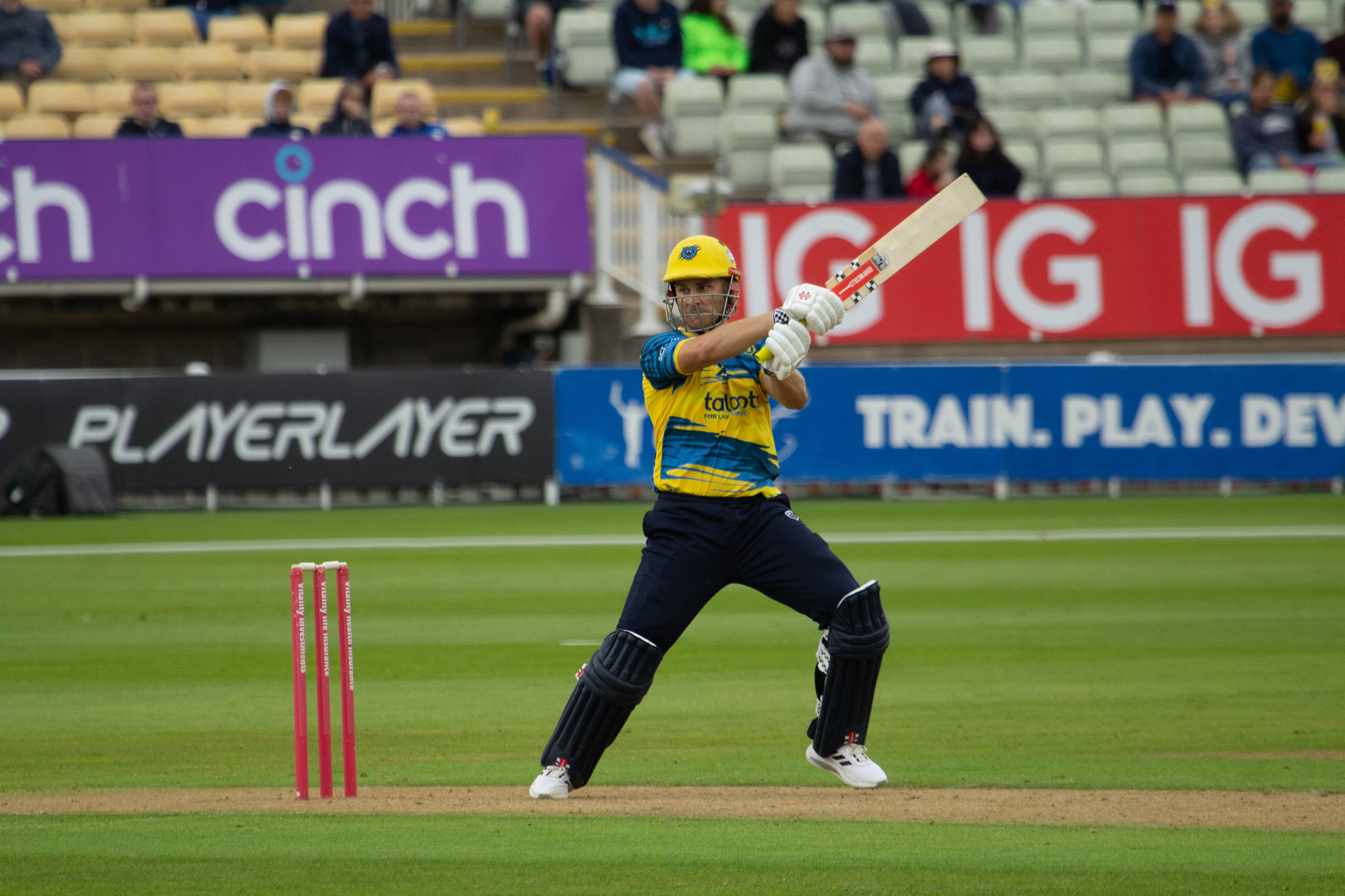 Sam Hain crunches the ball through the off-side