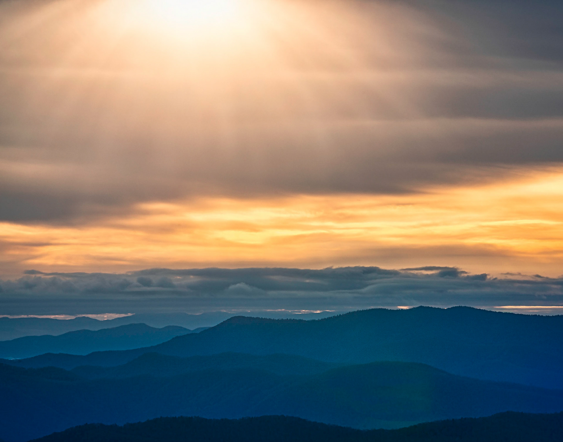 Sun peeking over the Smokies