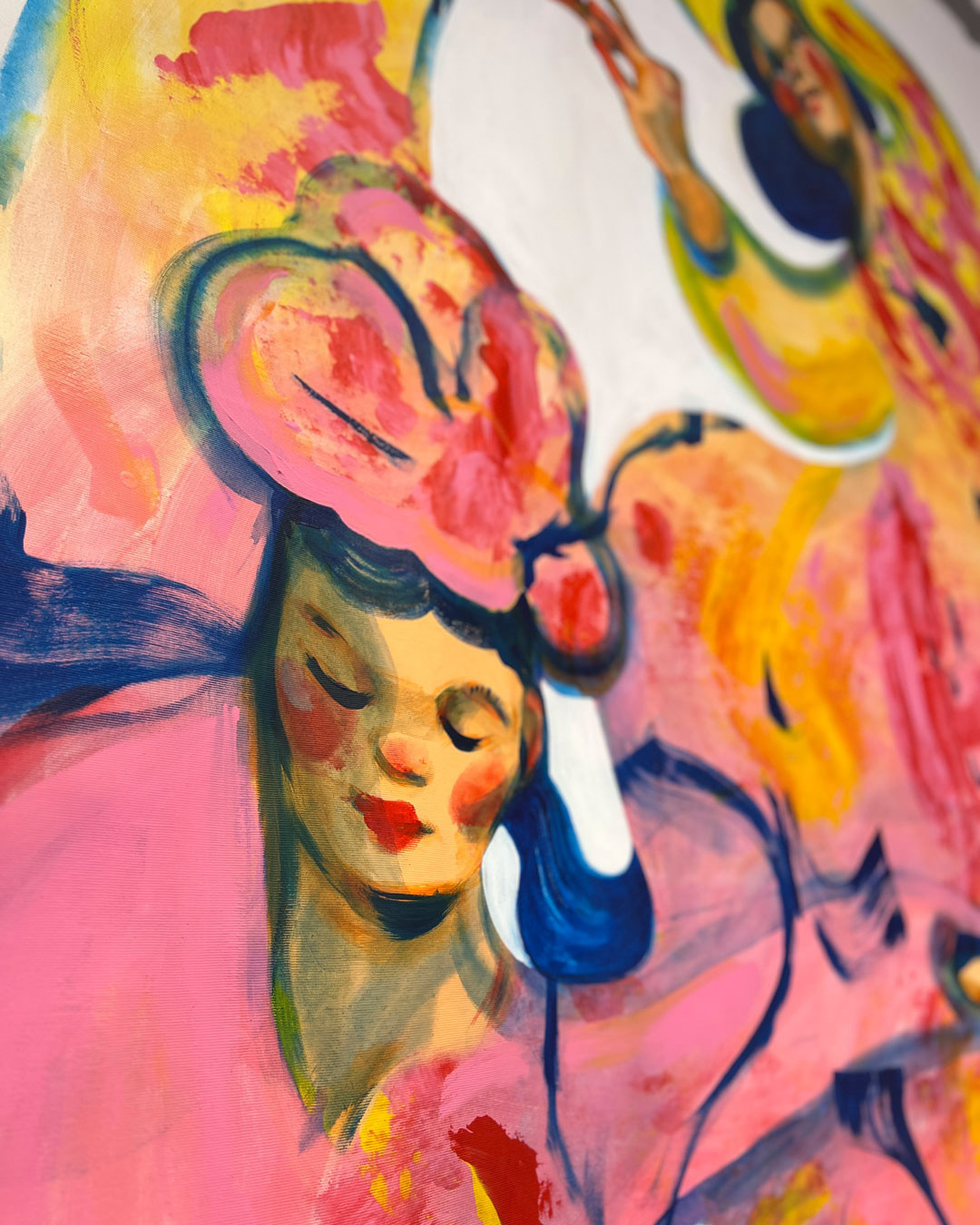 Detailed view of The Three Graces painting, showcasing vibrant brushstrokes, floral abstractions, and the figures’ serene expressions.
