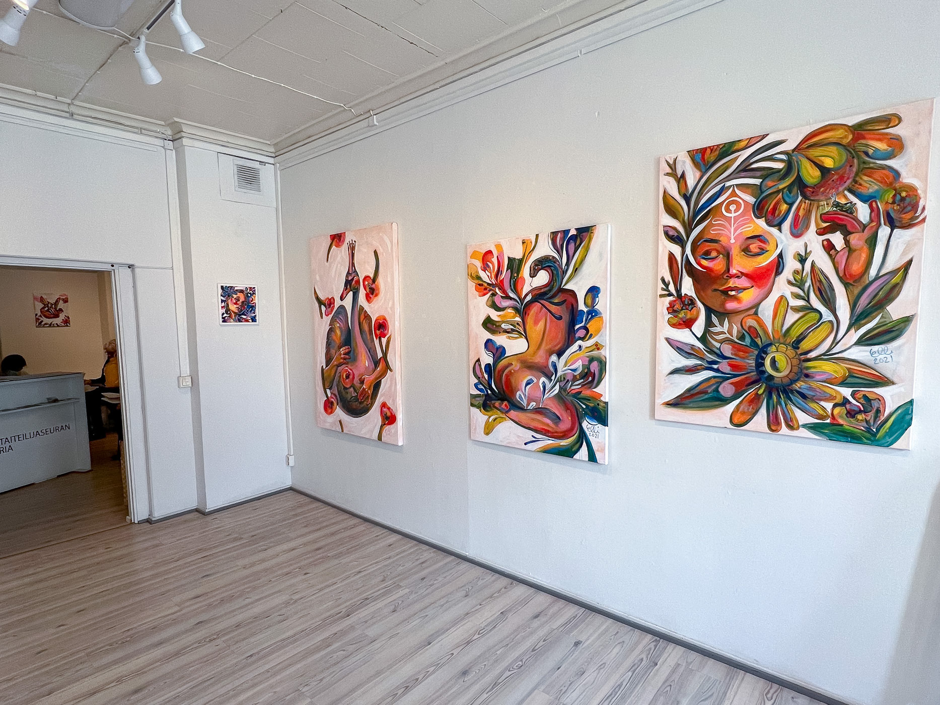A view of the gallery space highlighting the symbiotic flow between the figurative paintings and the natural light of P-galleria.