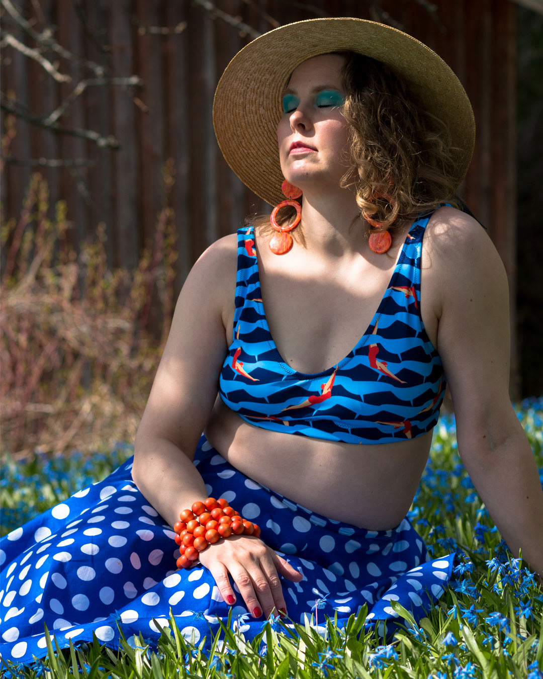 Experience the artistry of bikini fashion photography by Timo Ahjotuli, capturing the beauty of Terese Kühl in Elli Maanpää's vibrant Bikini Collection.