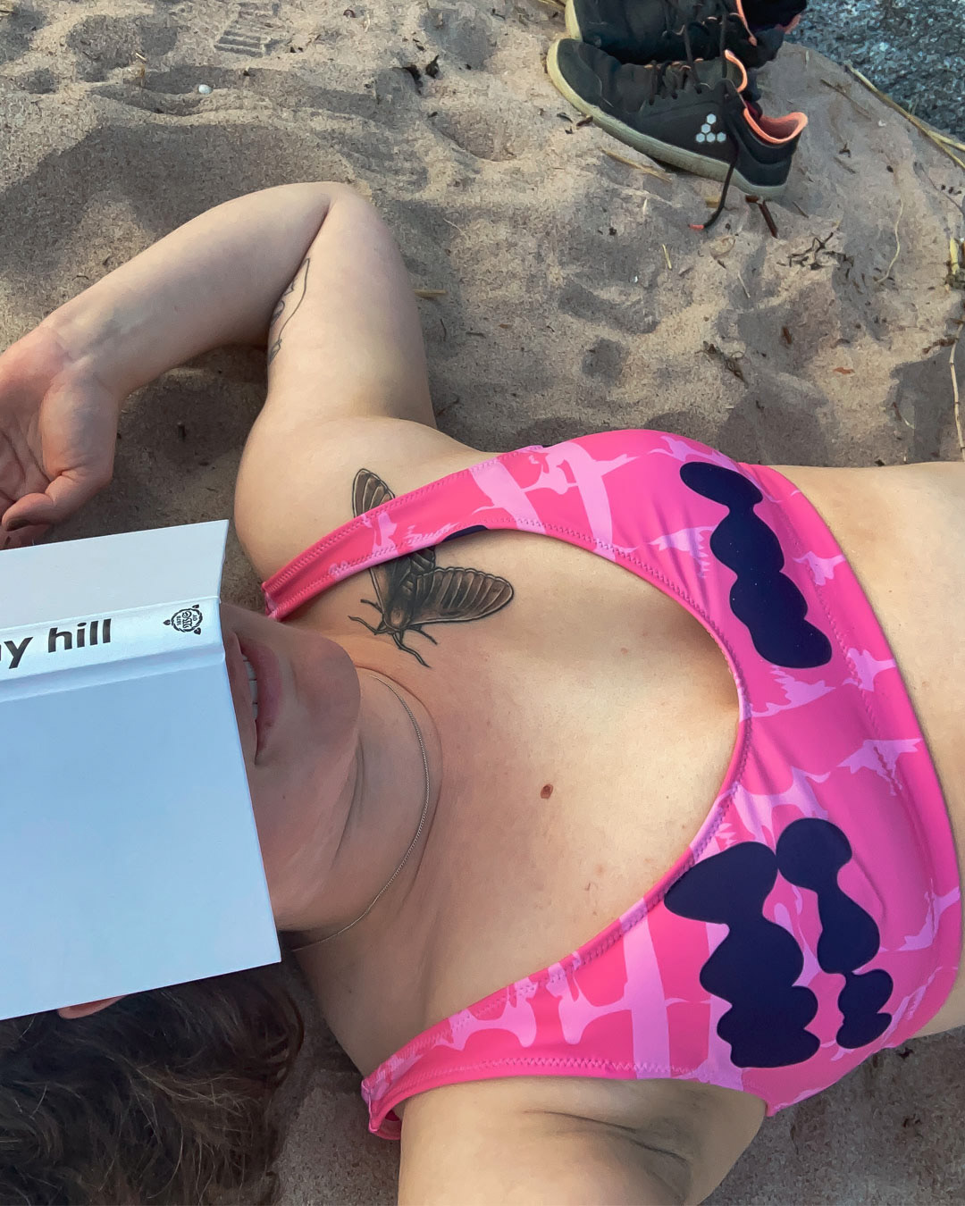 Linnea radiates book lovers summer vibes in these bikinis.