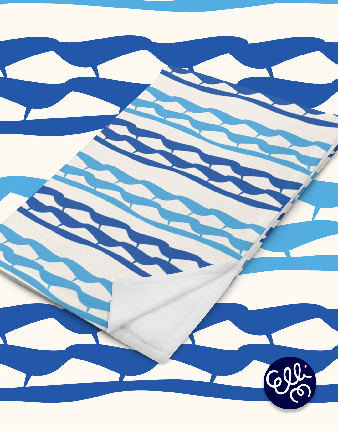 Colorful towel featuring Maanpää's designs.
