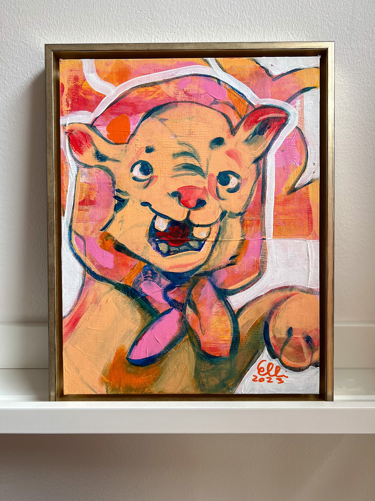Vibrant animal painting featuring Lion Cub with a headscarf.