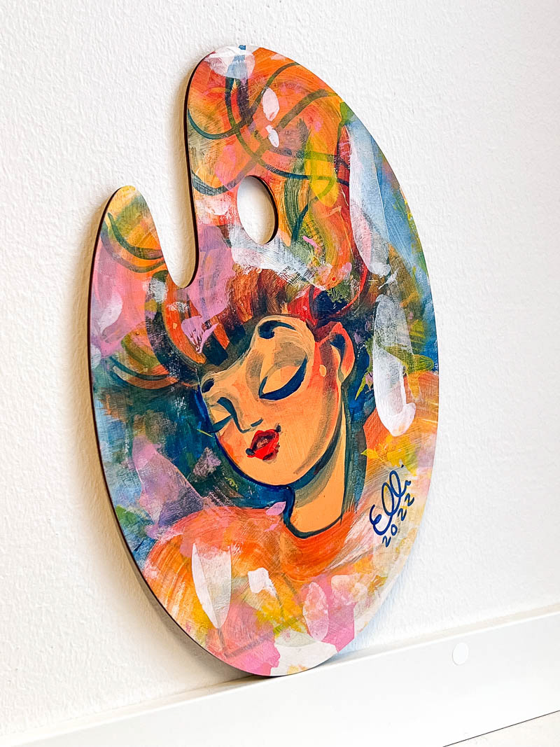 Acrylic on palette, woman's peaceful expression.