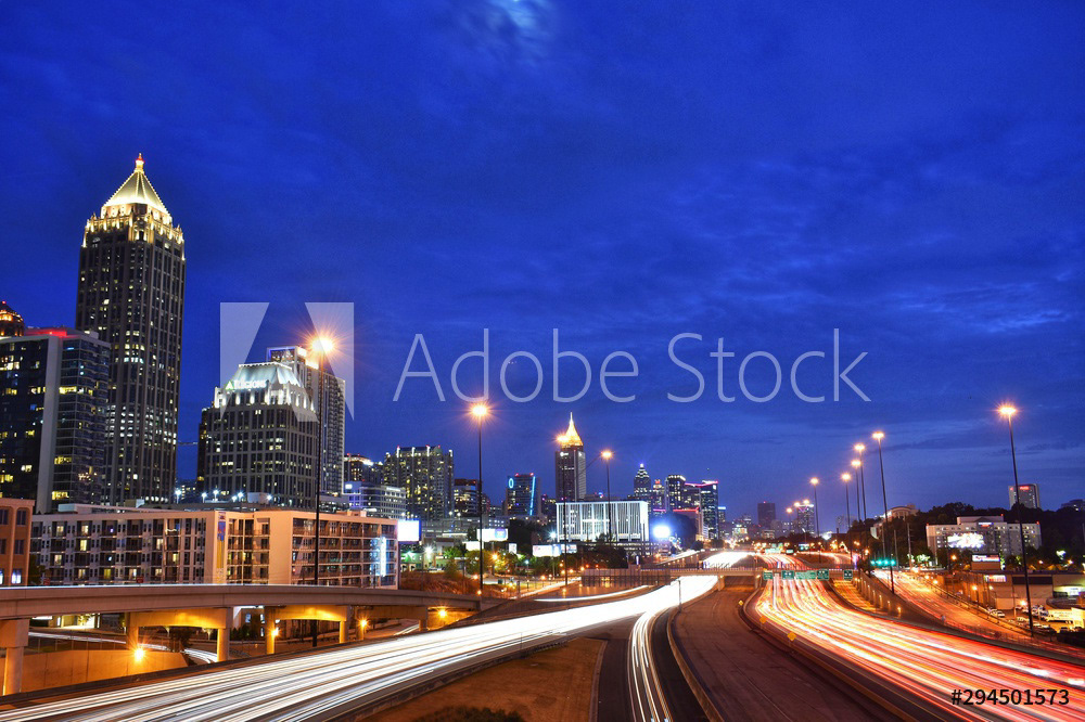 Downtown Atlanta Cityscape & Traffic At Sunset