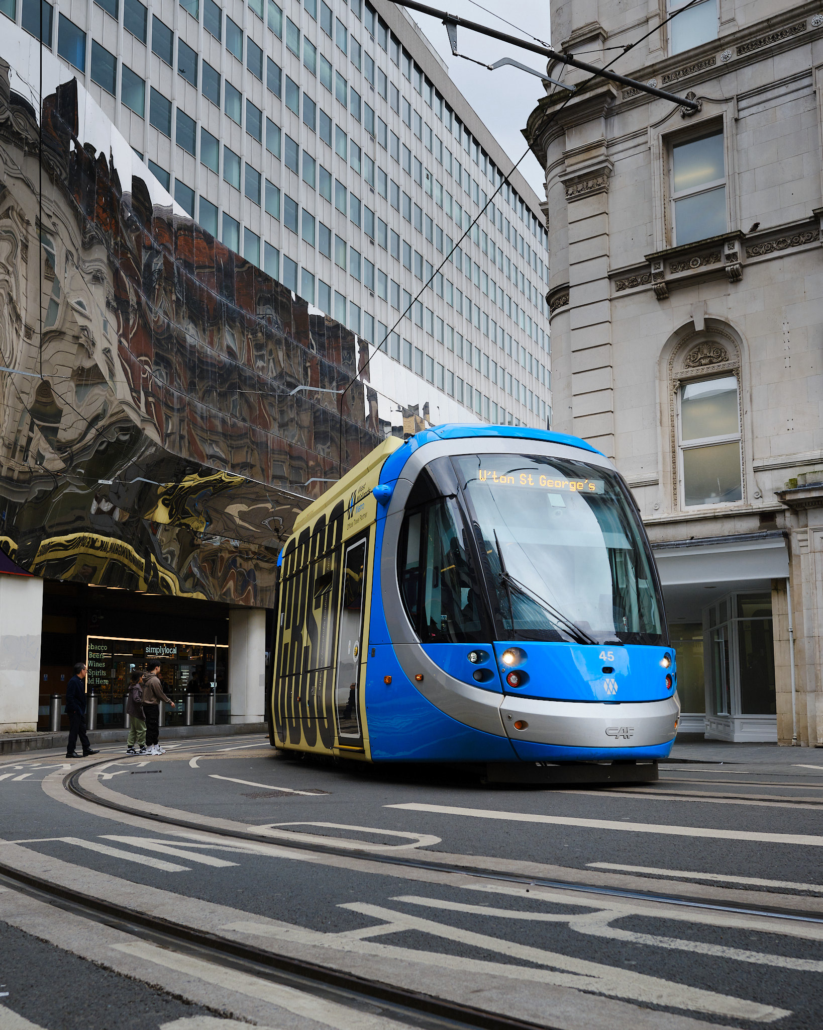 Blue tram in city centre