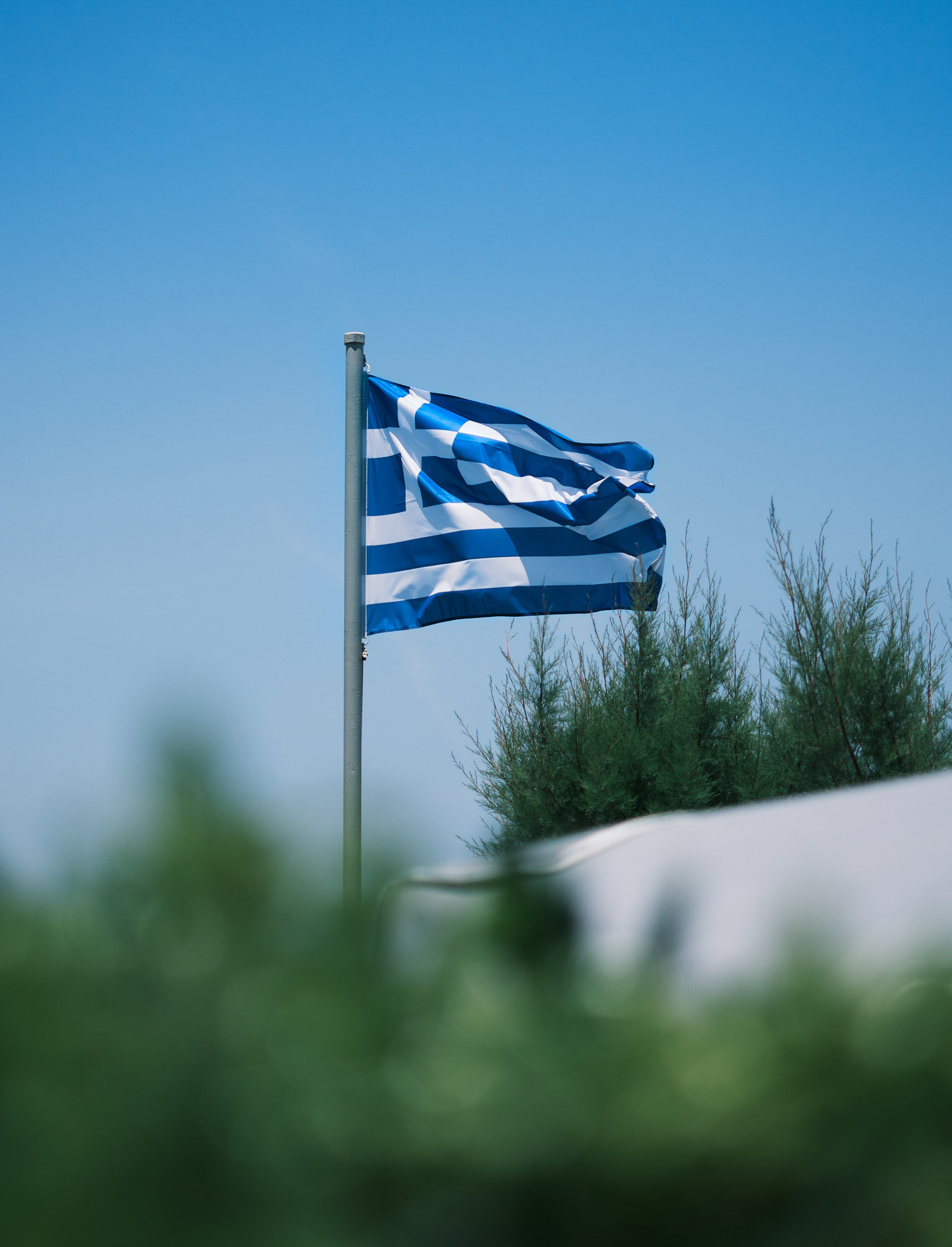 Greek flag blowing in the wind