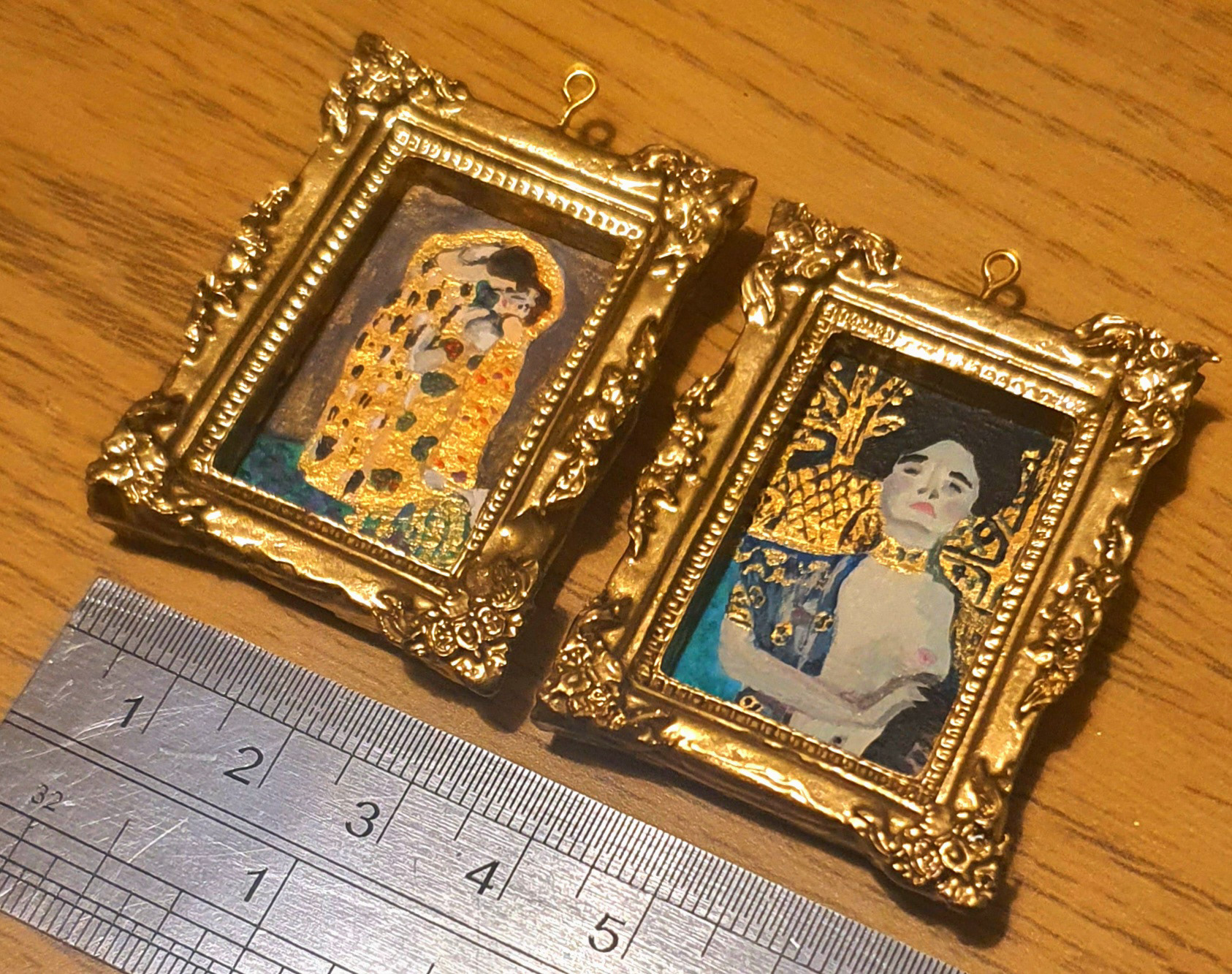 Hand painted 3cm x 1.5cm acrylic paintings in a sculpted and resin cast frame