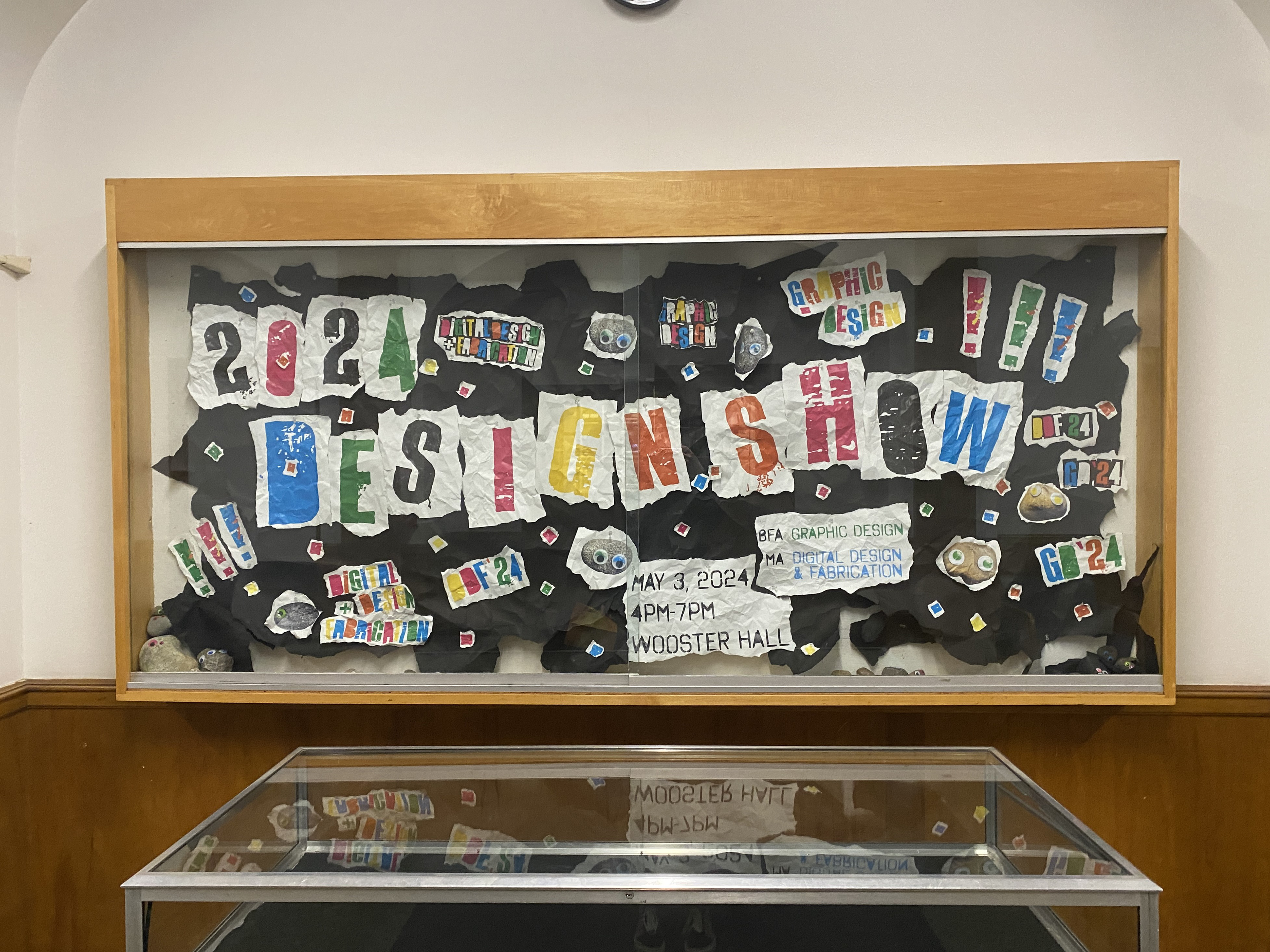 Large display poster in display case, was reused during day of show for a photo opportunity.