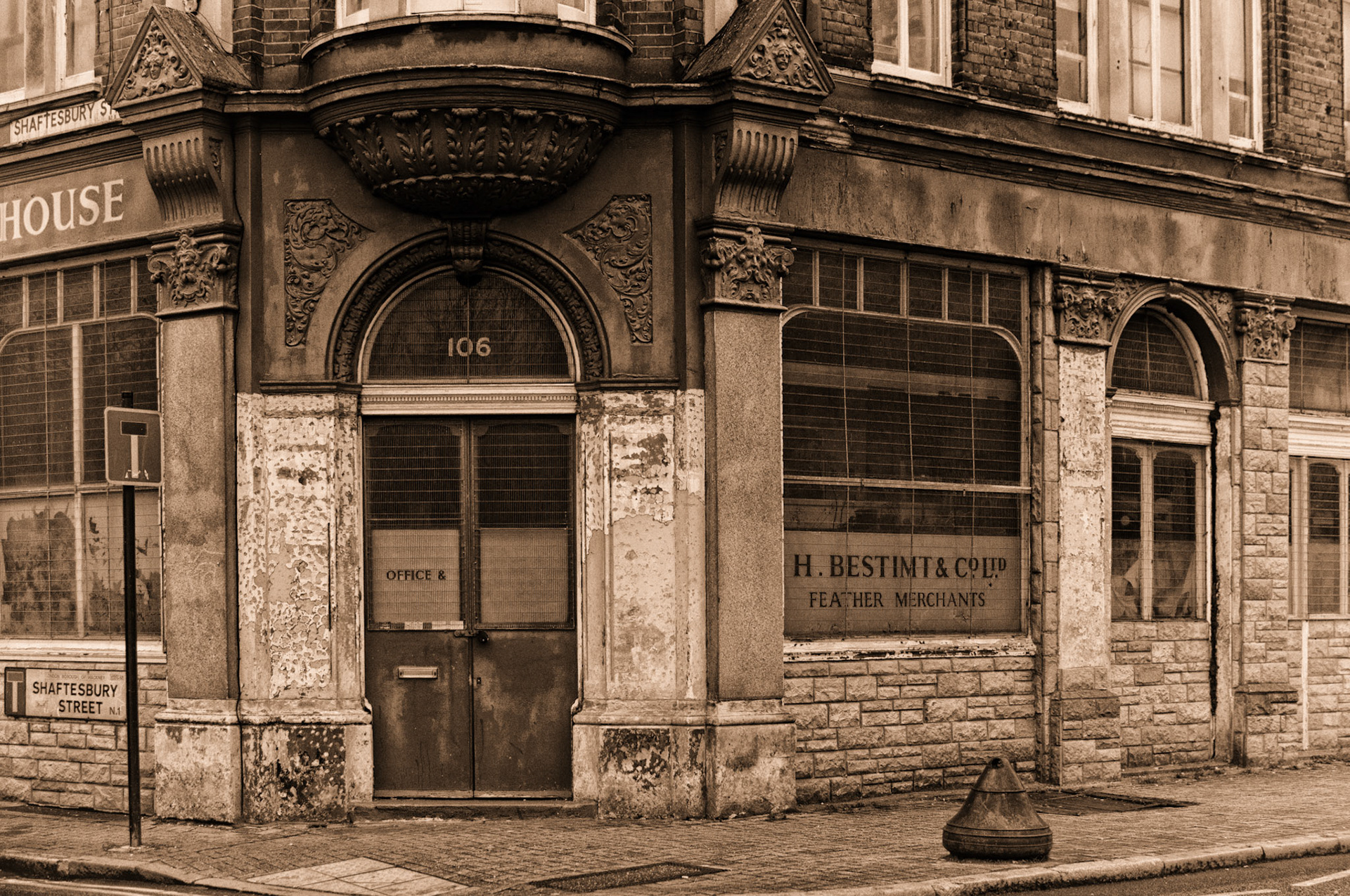 I've walked this road many times, but only just noticed the feather merchants!