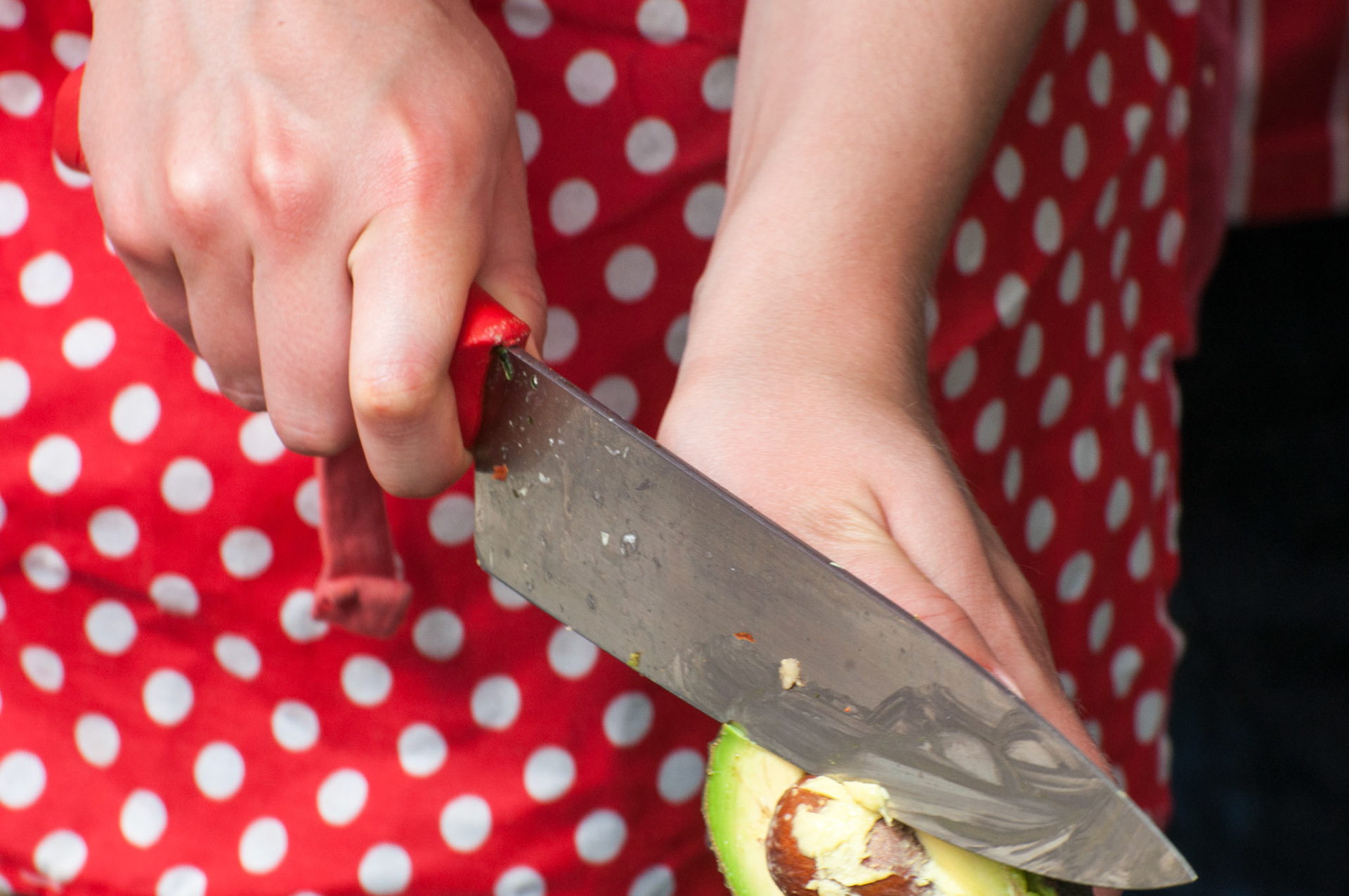 This lady has obviously never de-stoned an avocado before. If only she knew the easy way.