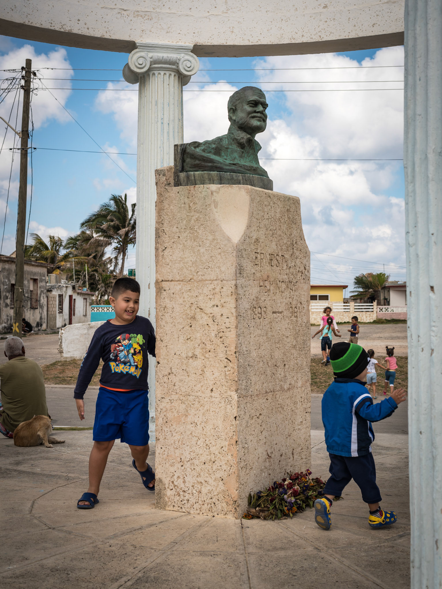 Kids Around The Statue