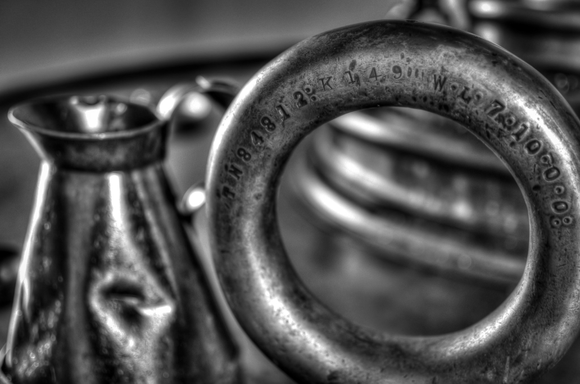 I haven't the foggiest what you need this huge circular piece for, nor why it needs a serial number. But it made an interesting article against the oil can.