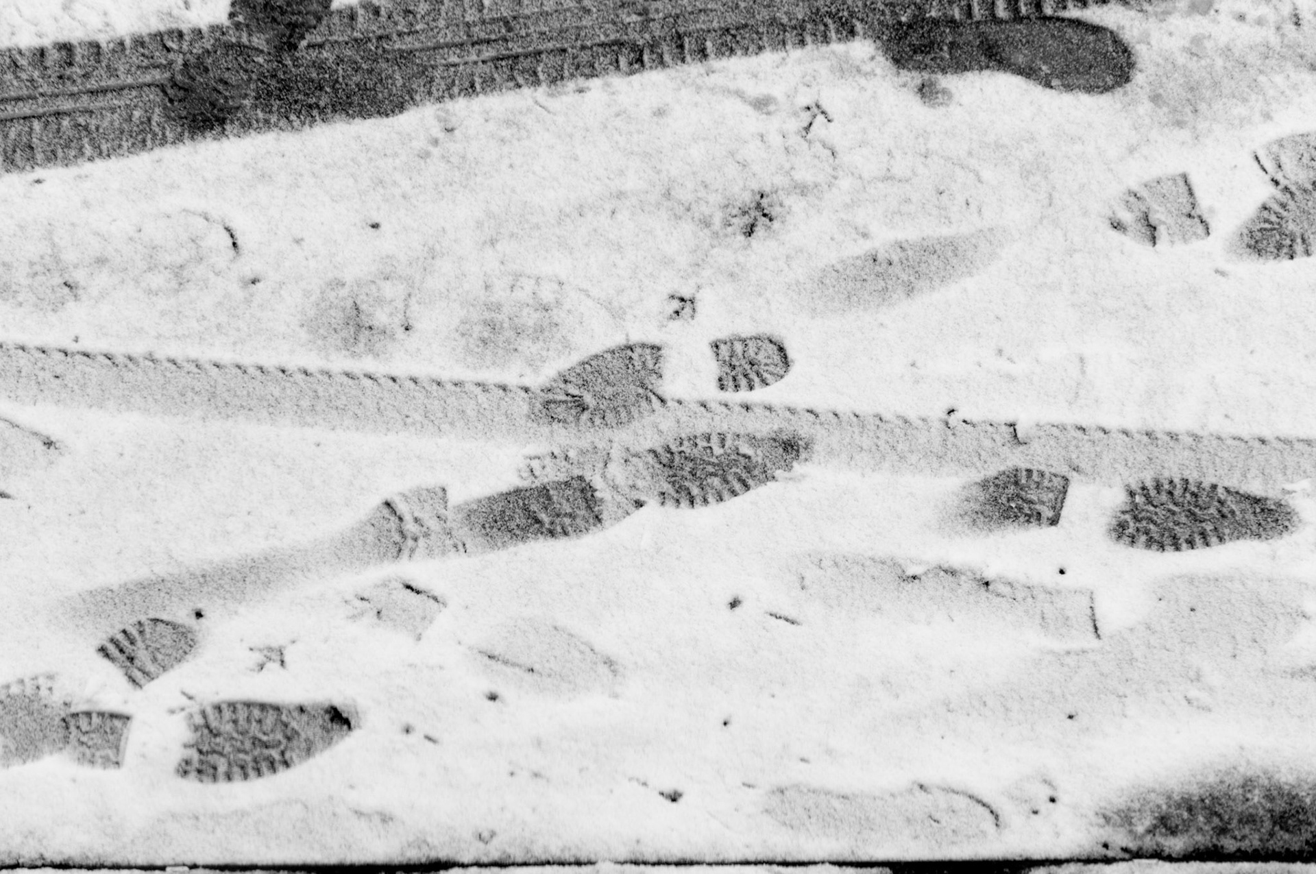 When the ice comes, man and machine share the road where it's been gritted.