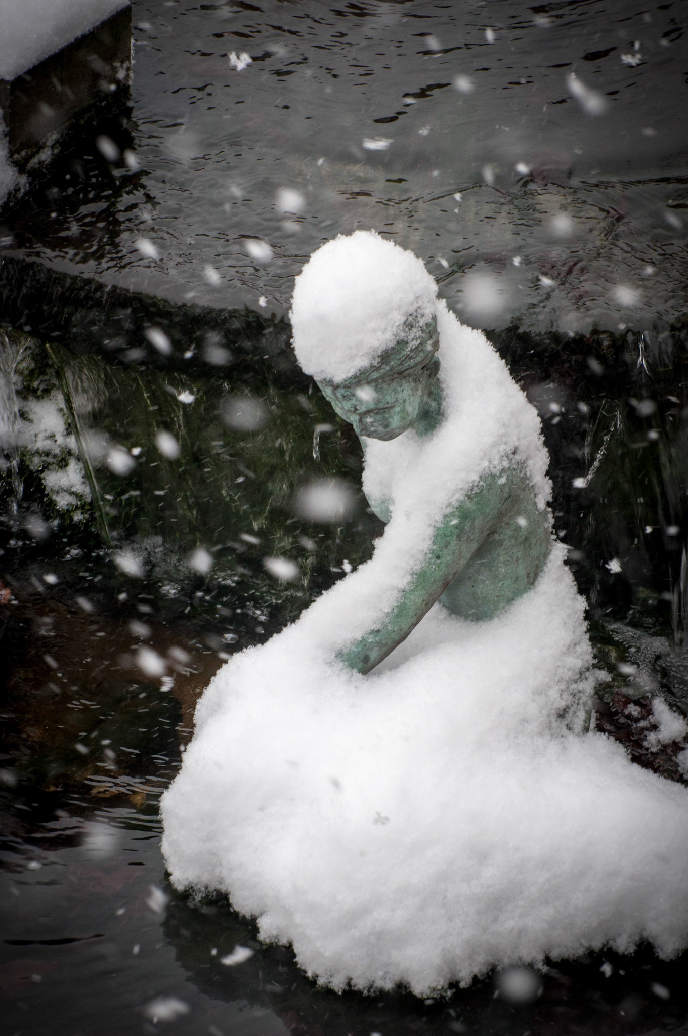 Our work statue looks a bit chilly today.