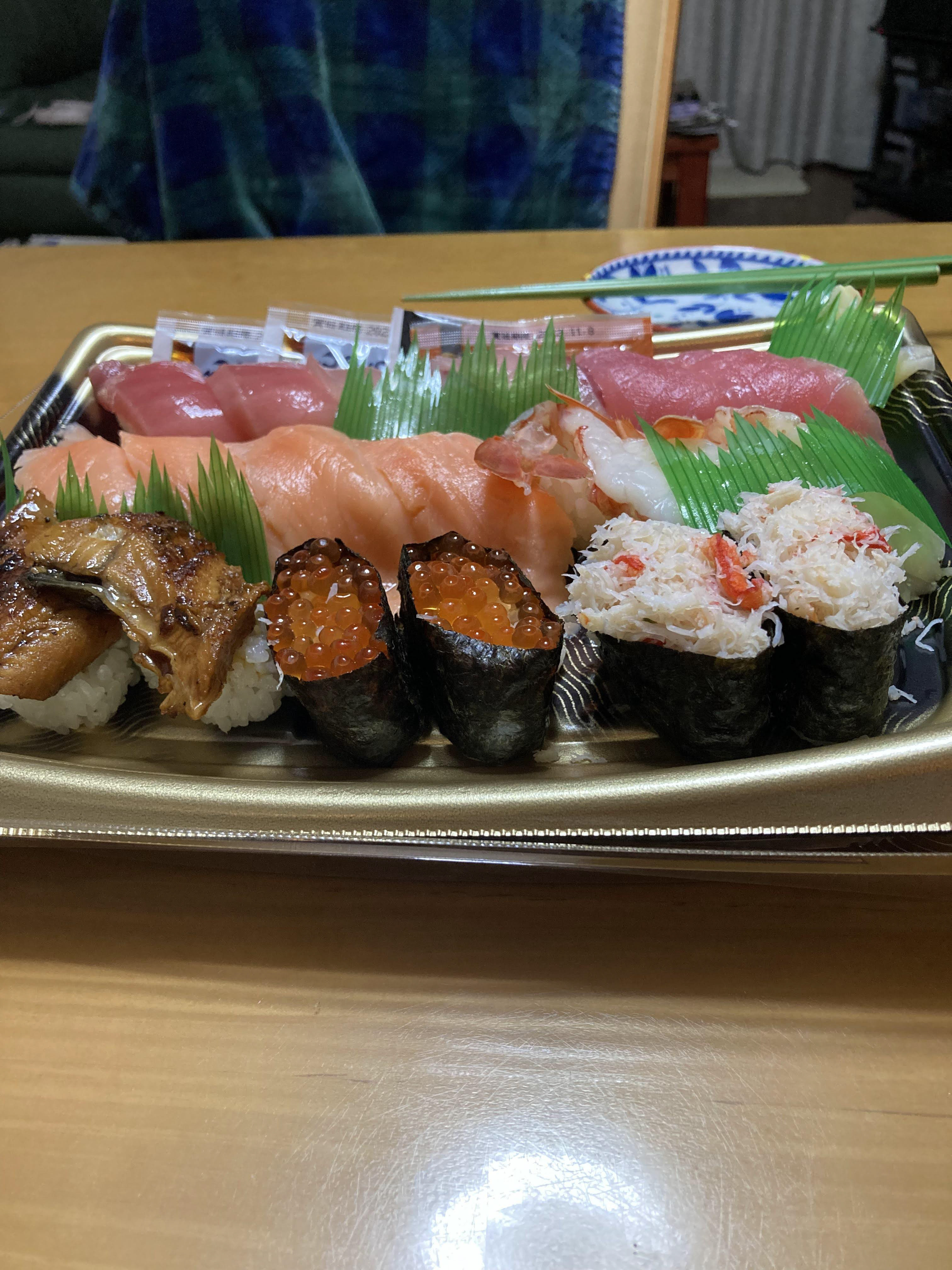 celebrating the transition of hotel to residence quarantine with cheap yet delectable sushi