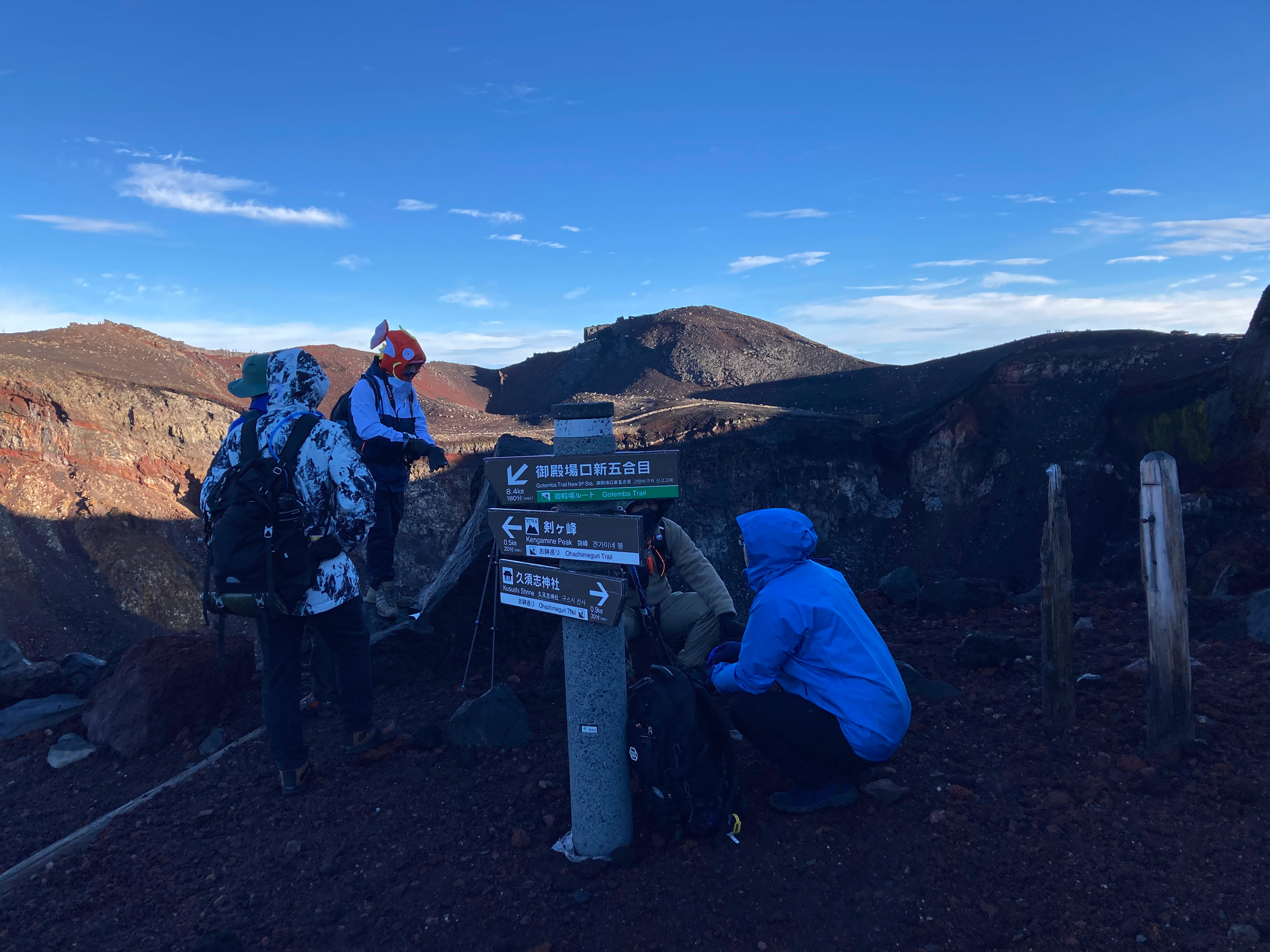 on top of the volcanic crater! with a hiker wearing the best hat