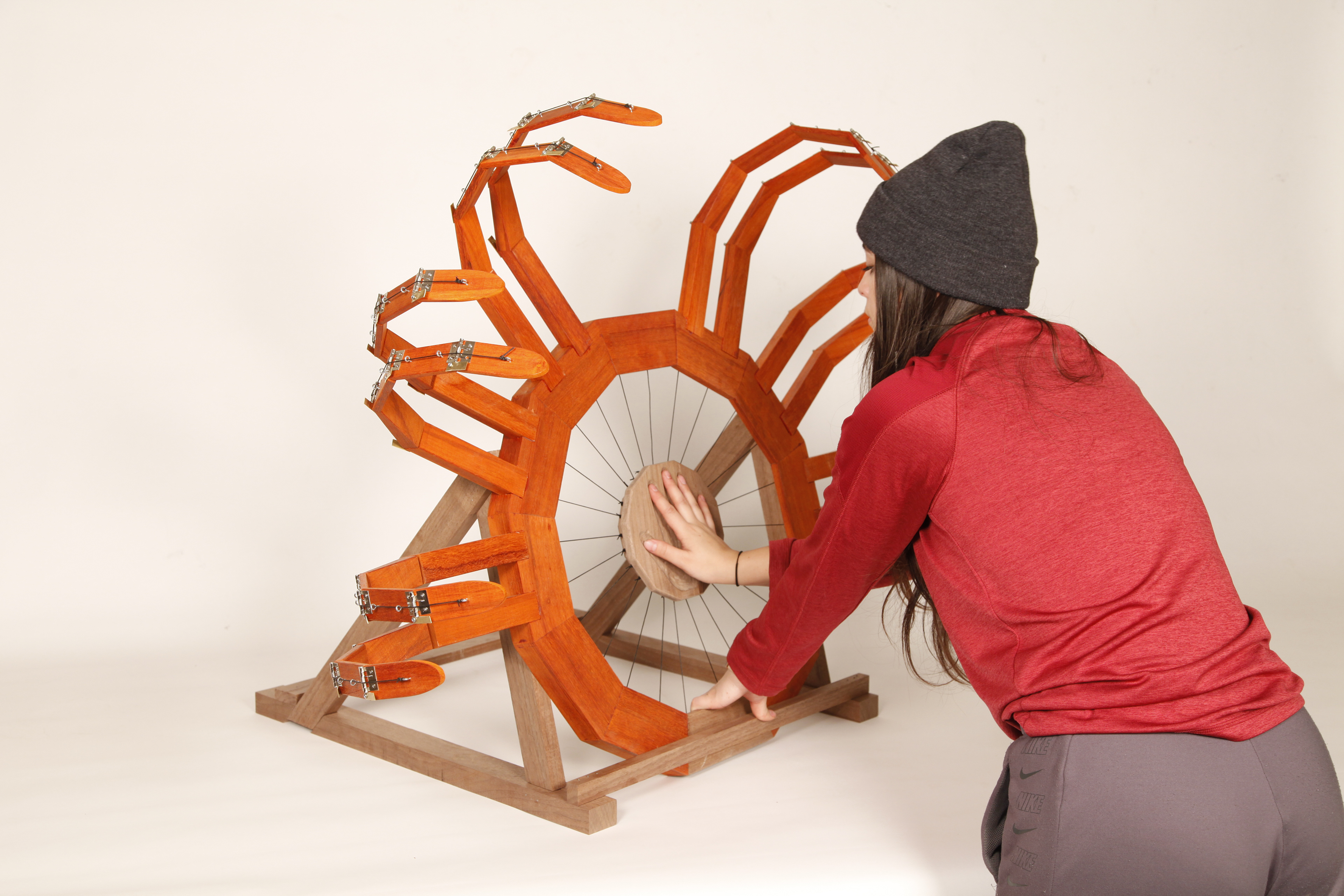 "Hug Me" - padauk, walnut, cotton string, metal hinges