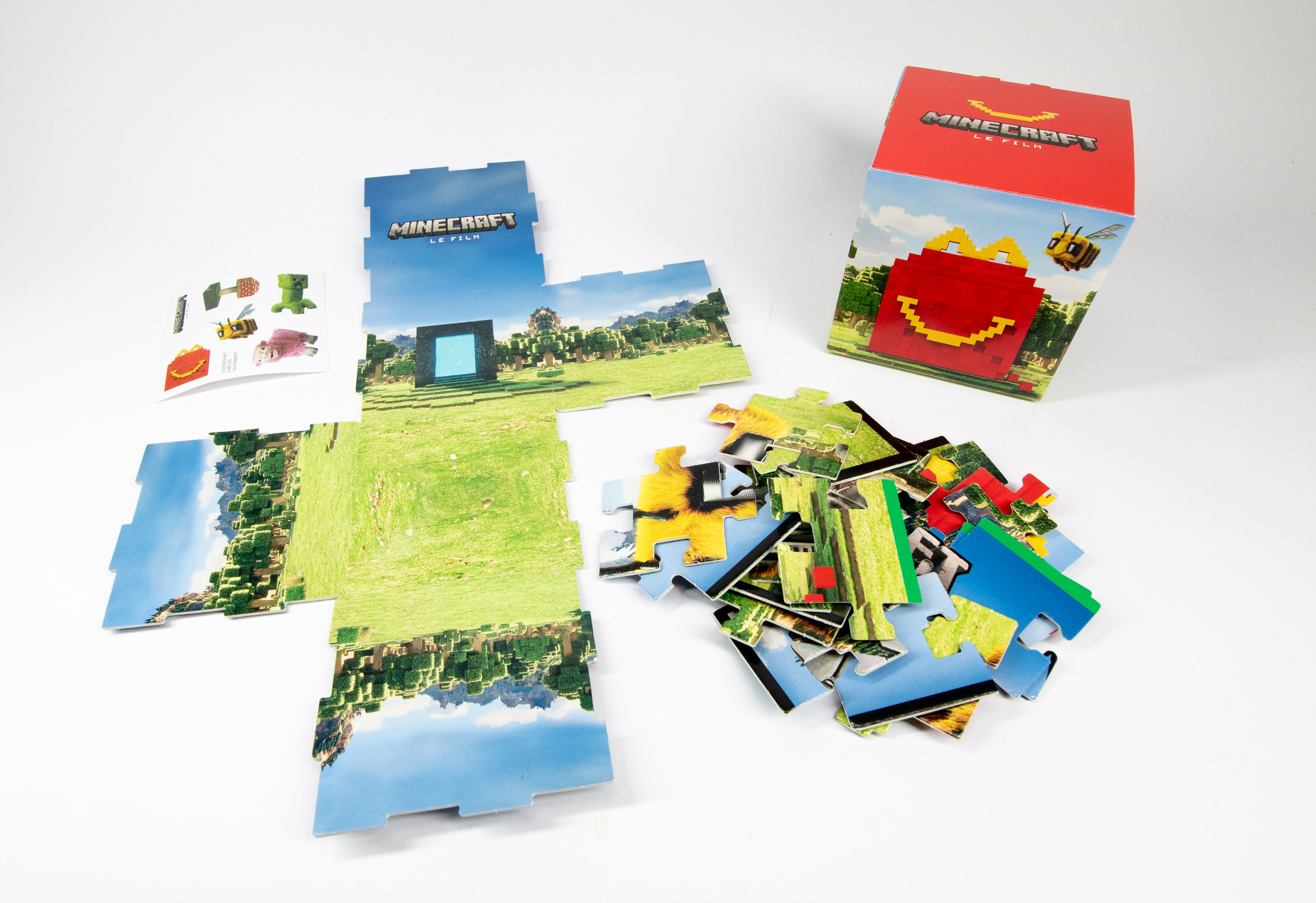 Jigsaw puzzle (A) with block world and stickers  - production line photos