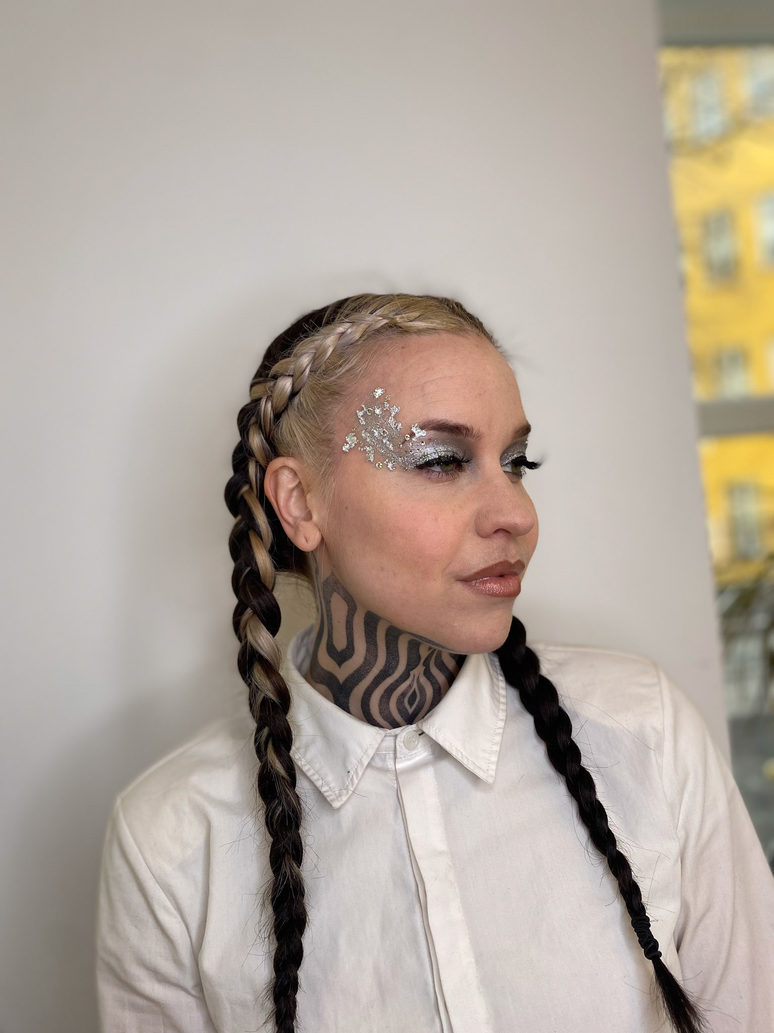 Creative makeup with silver flakes