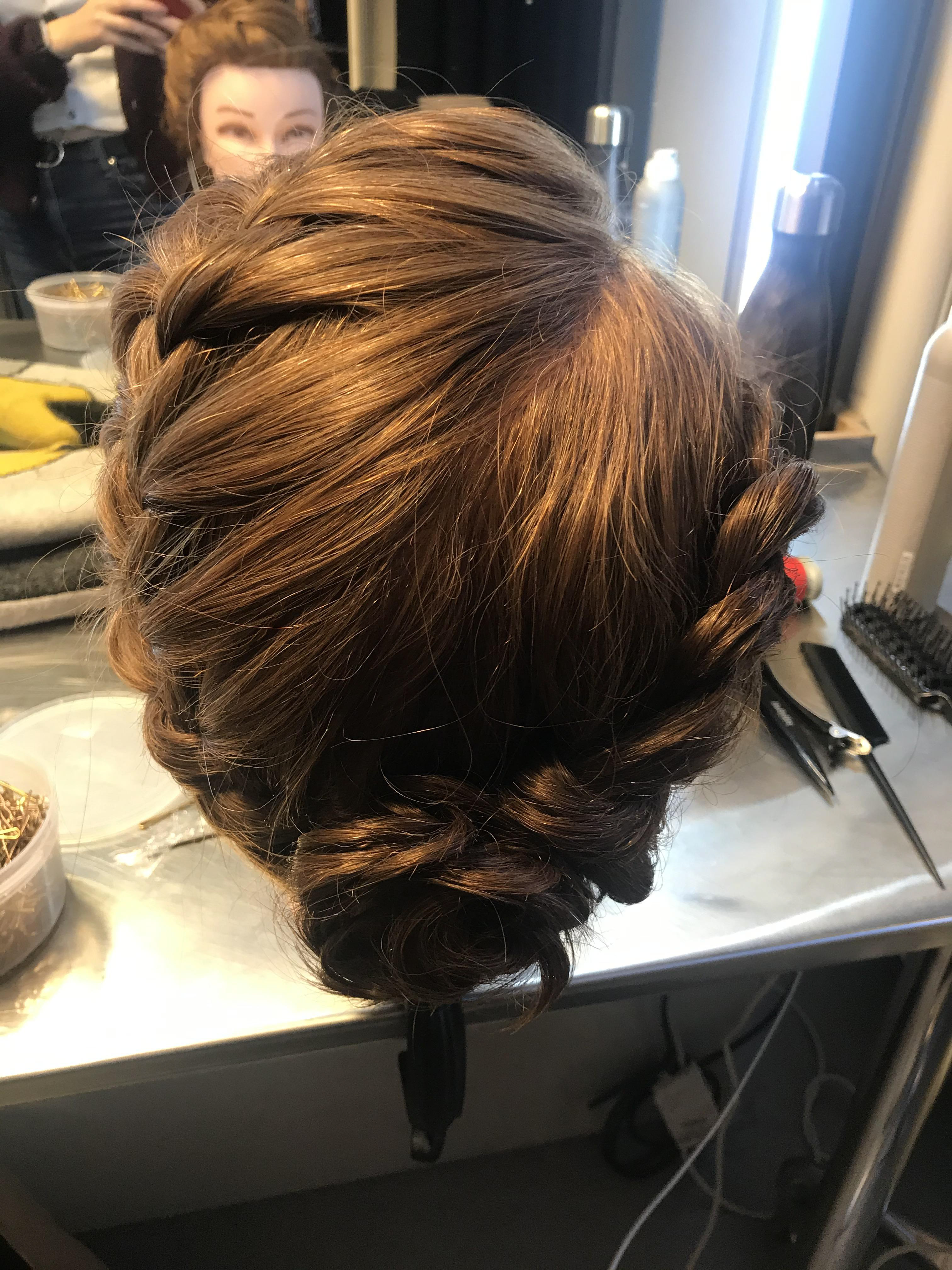 Braided low bun from two sides