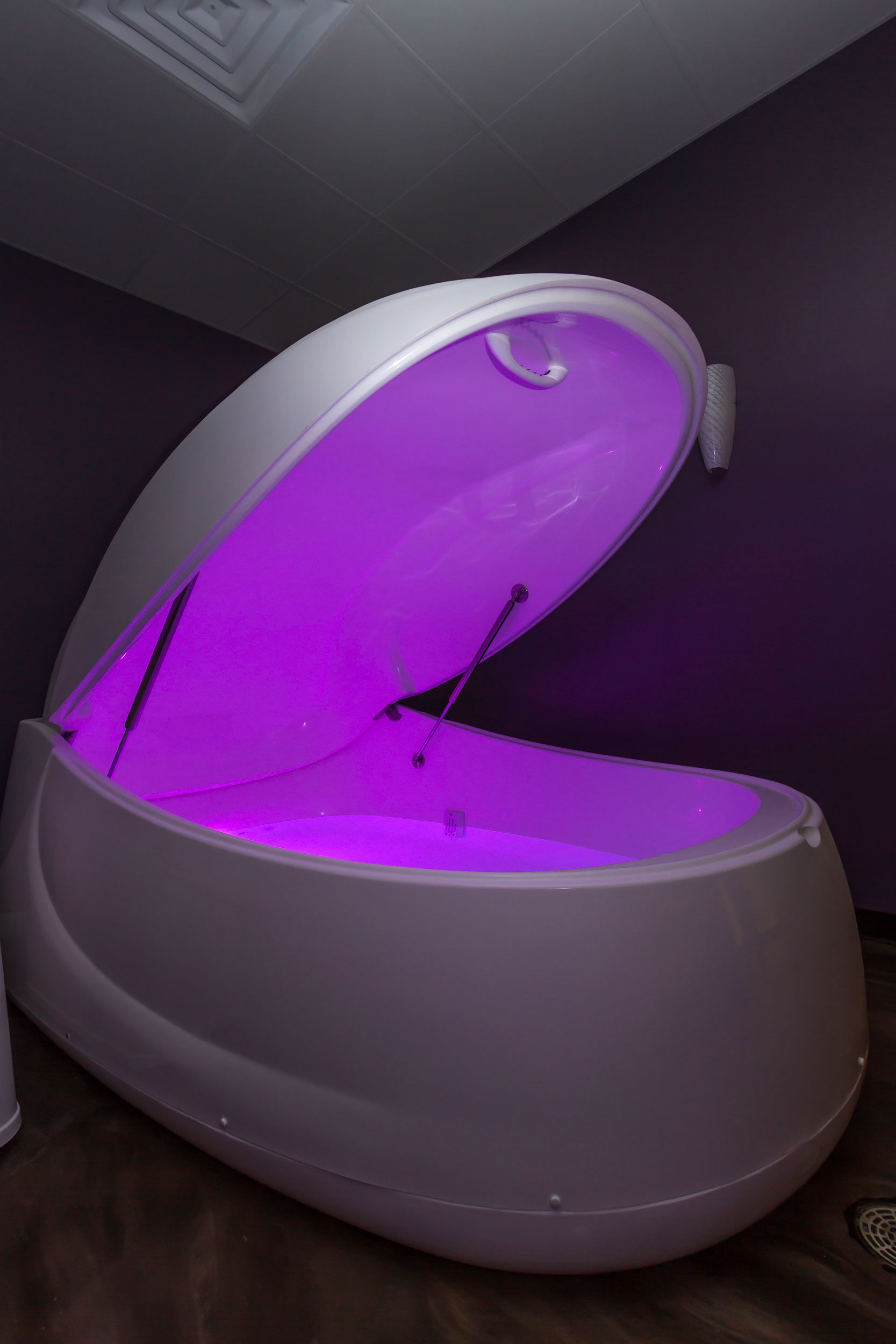 Float Life LLC float pod with purple light