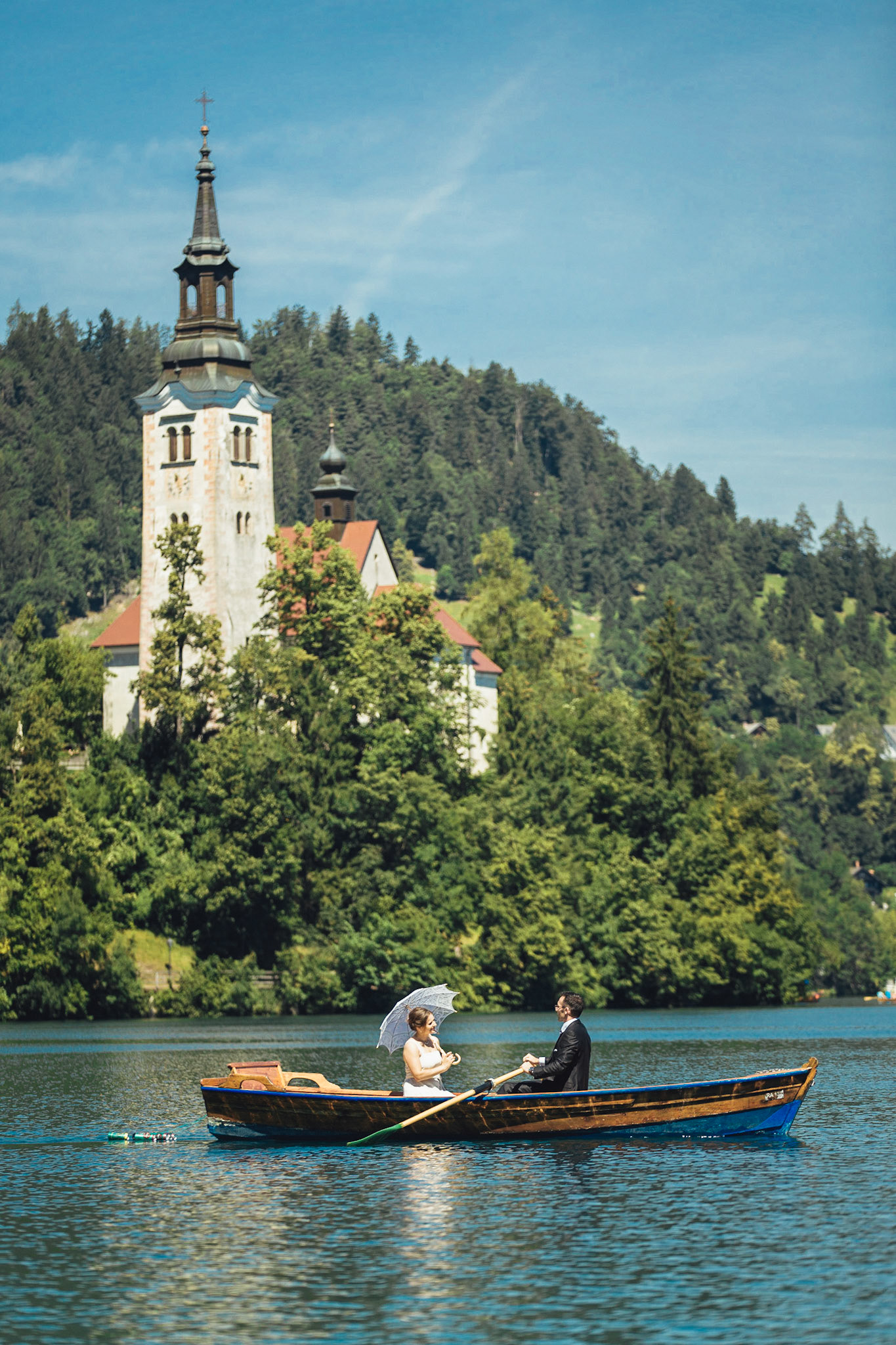 Rowing in front of Bled Island - Matej Kolaković Photography
