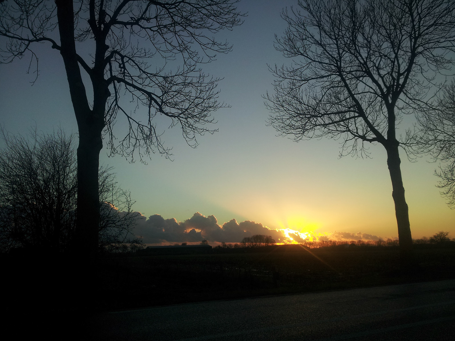 Winterse zonsondergang bij Deil