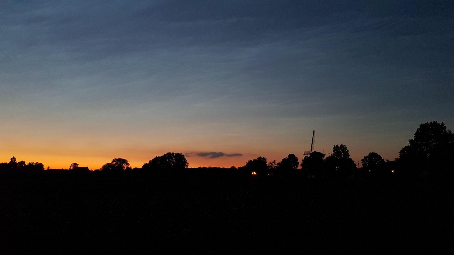 Zonsondergang met molen