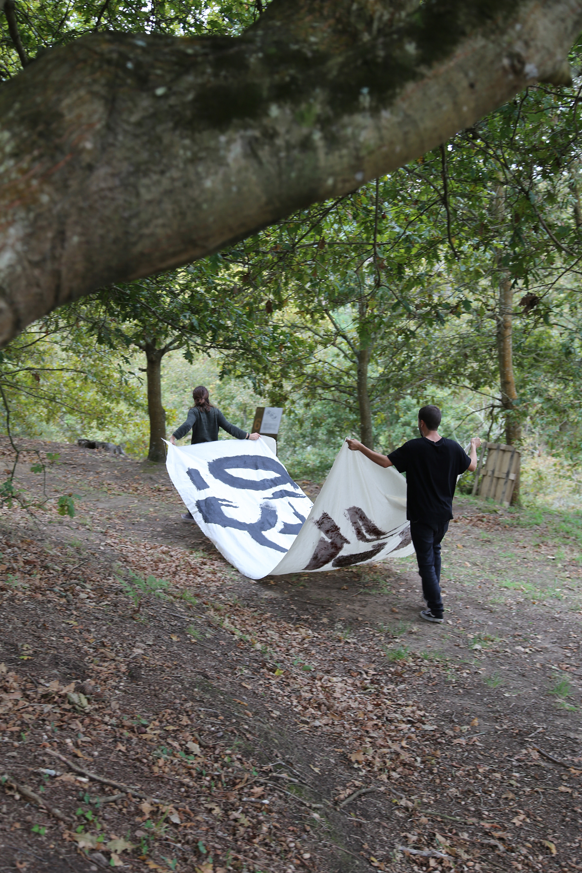 Recording of artist João Gomes Gago and archaeologist Pedro da Silva in performance - intervention in situ at the ruins of Castro de Ovil, 2022