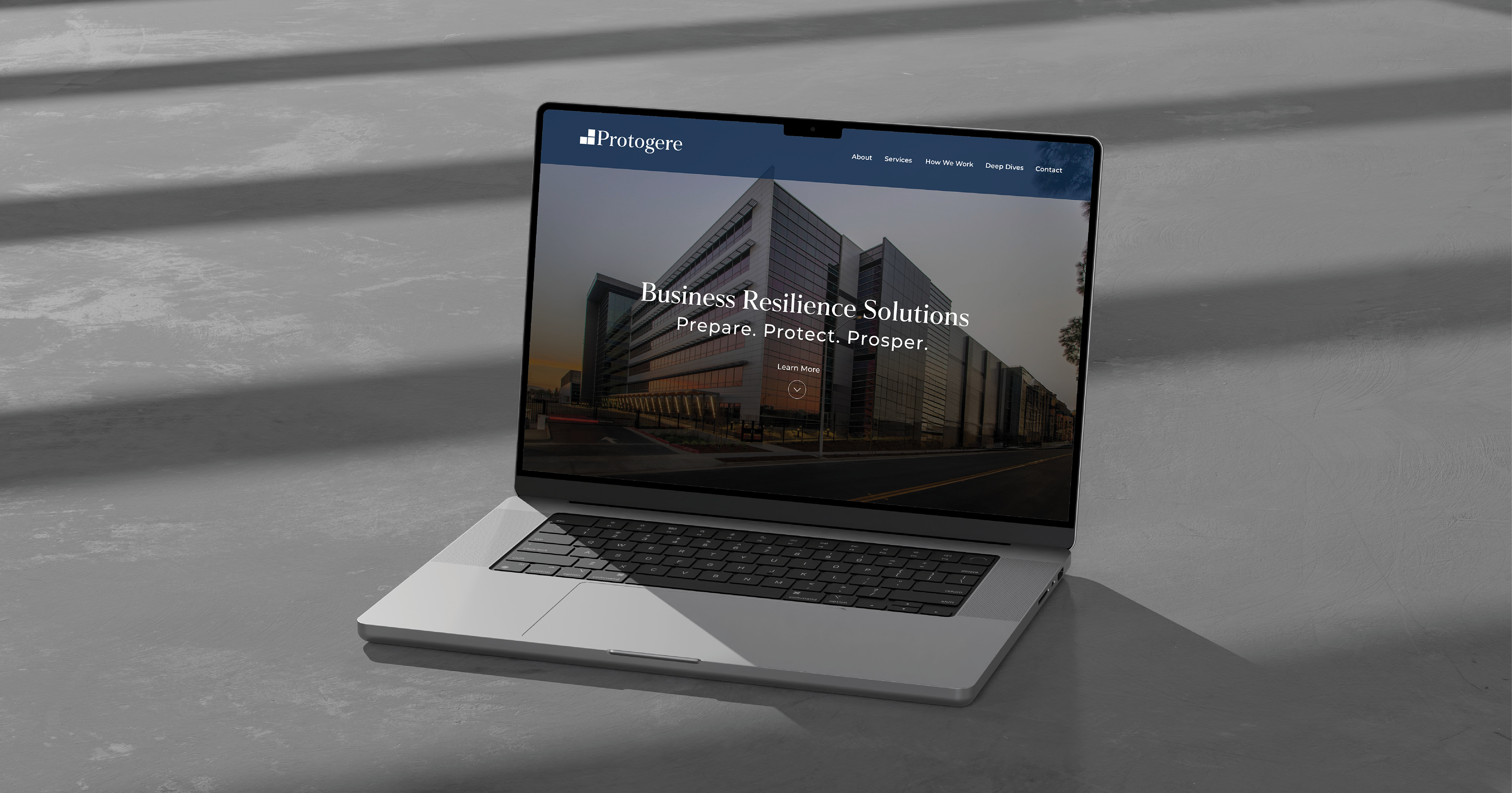Laptop with home page of website design for security advisory