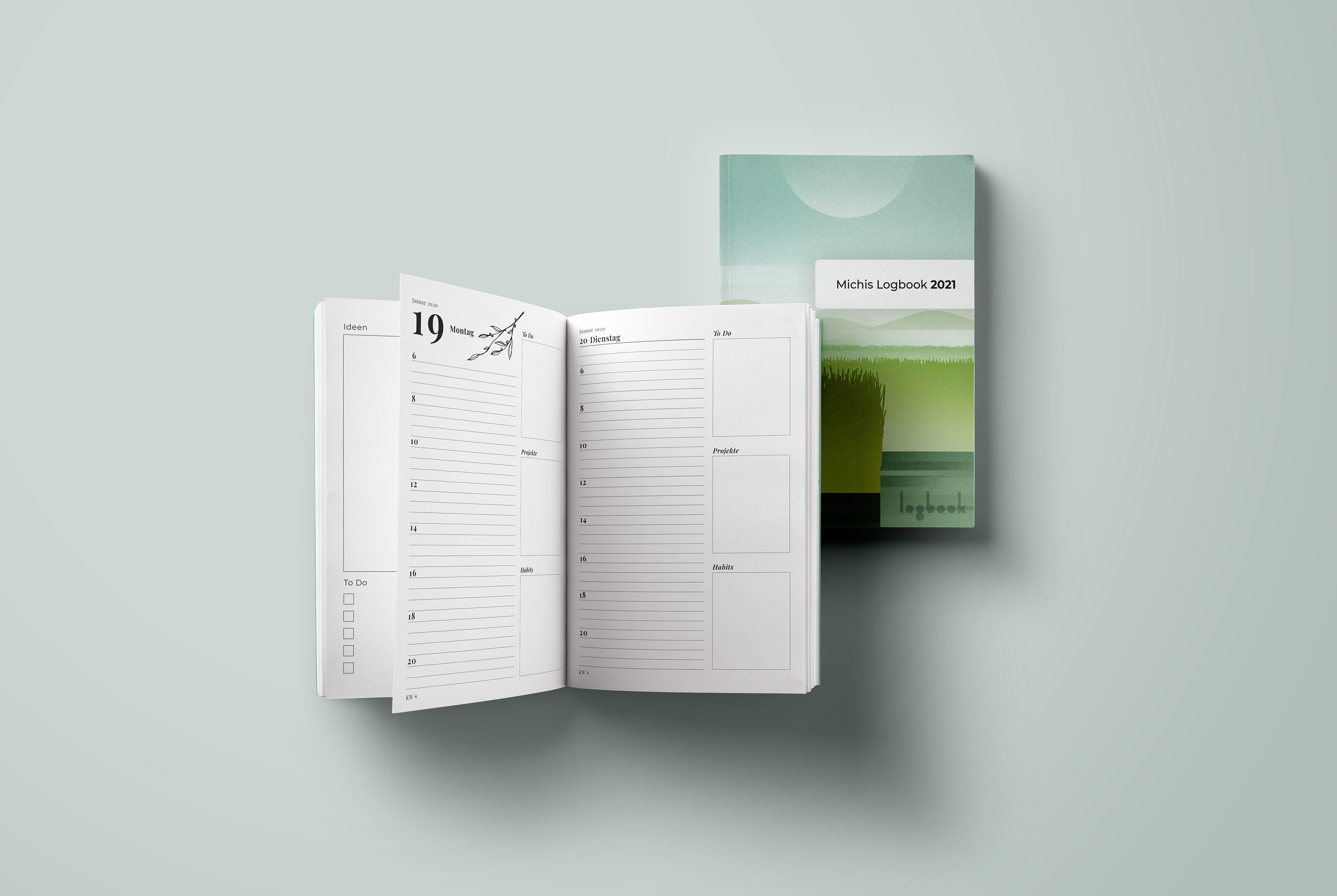 Two books on top of each other. The top one is open, and different calendar and notetaking pages can be seen. The bottom one is closed and a minimalist cover with the text "Michis Logbook 2021" can be seen.