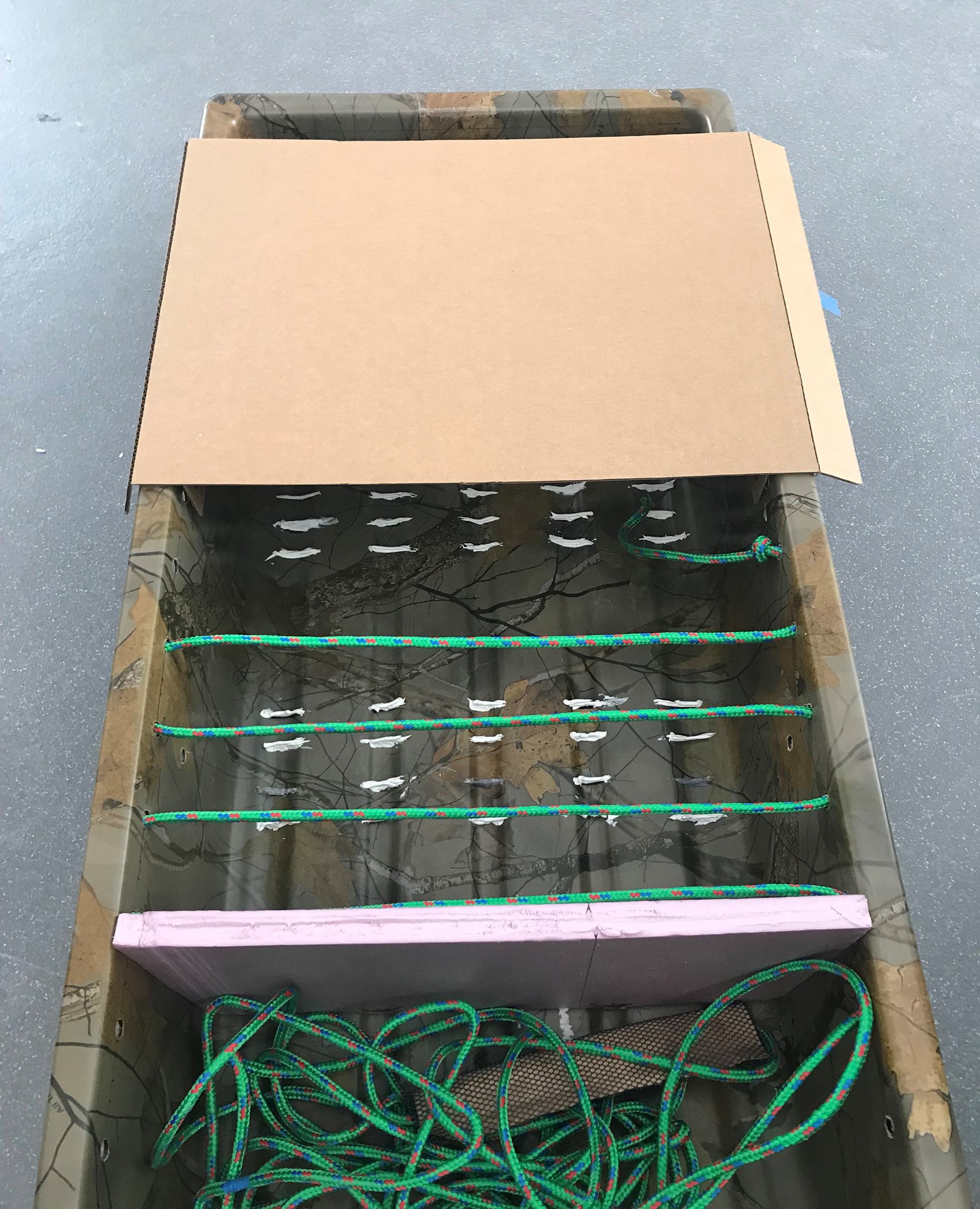 Sled with ropes and flat surface
