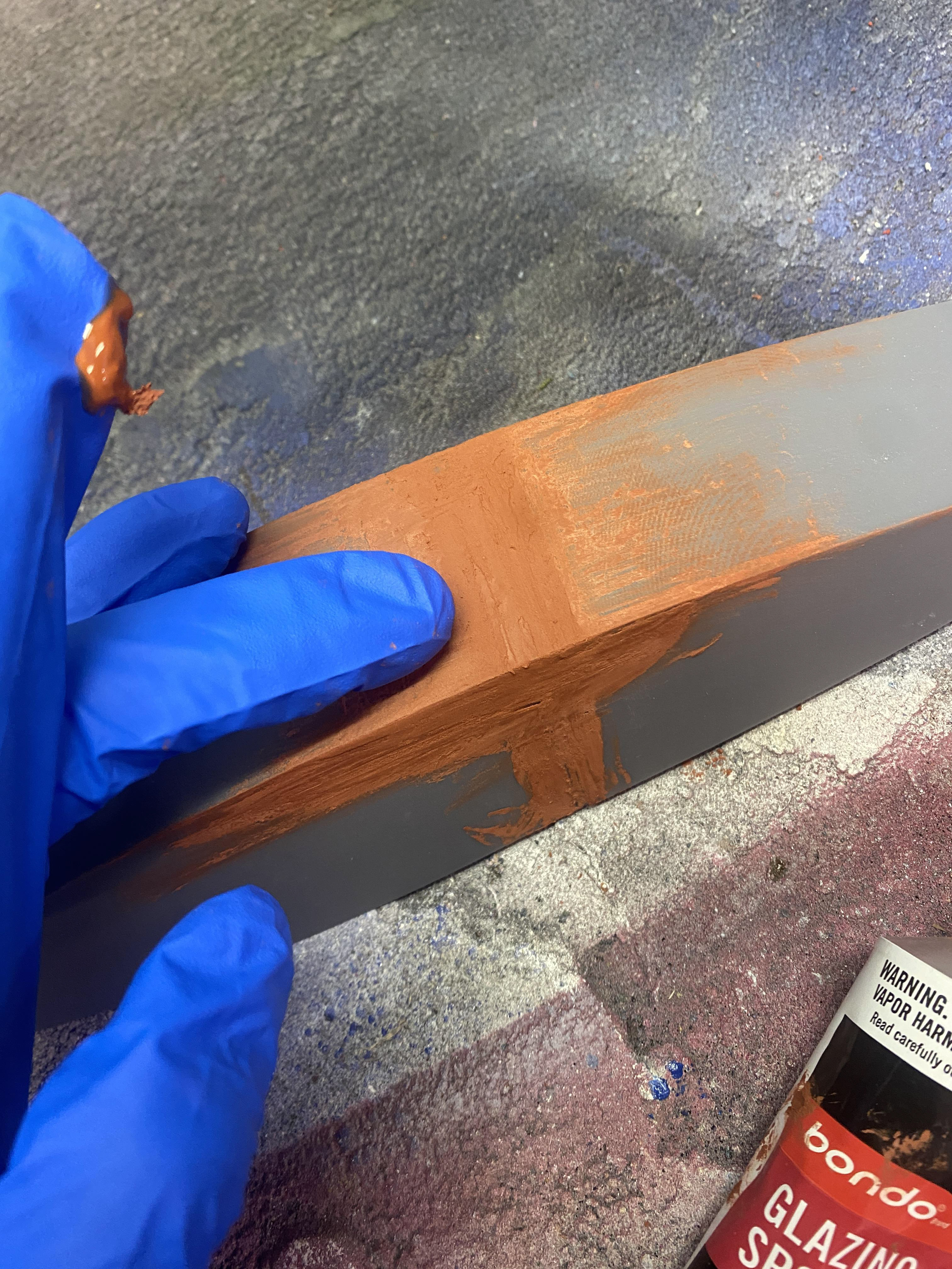 Adding bondo to the headlight Buck for Vacuum forming