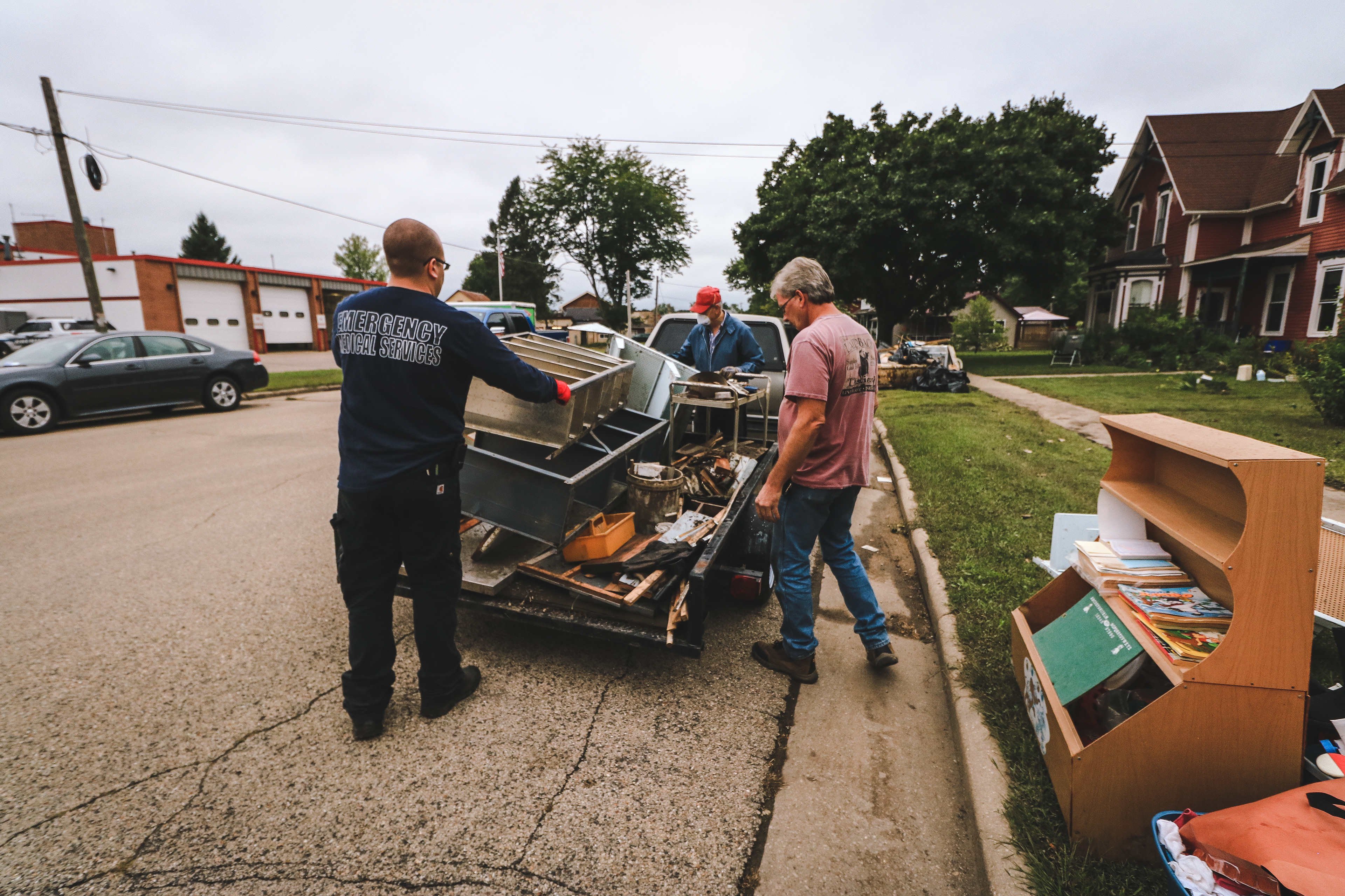 The streets of Mazomanie were lined with destroyed belongings following the flood.